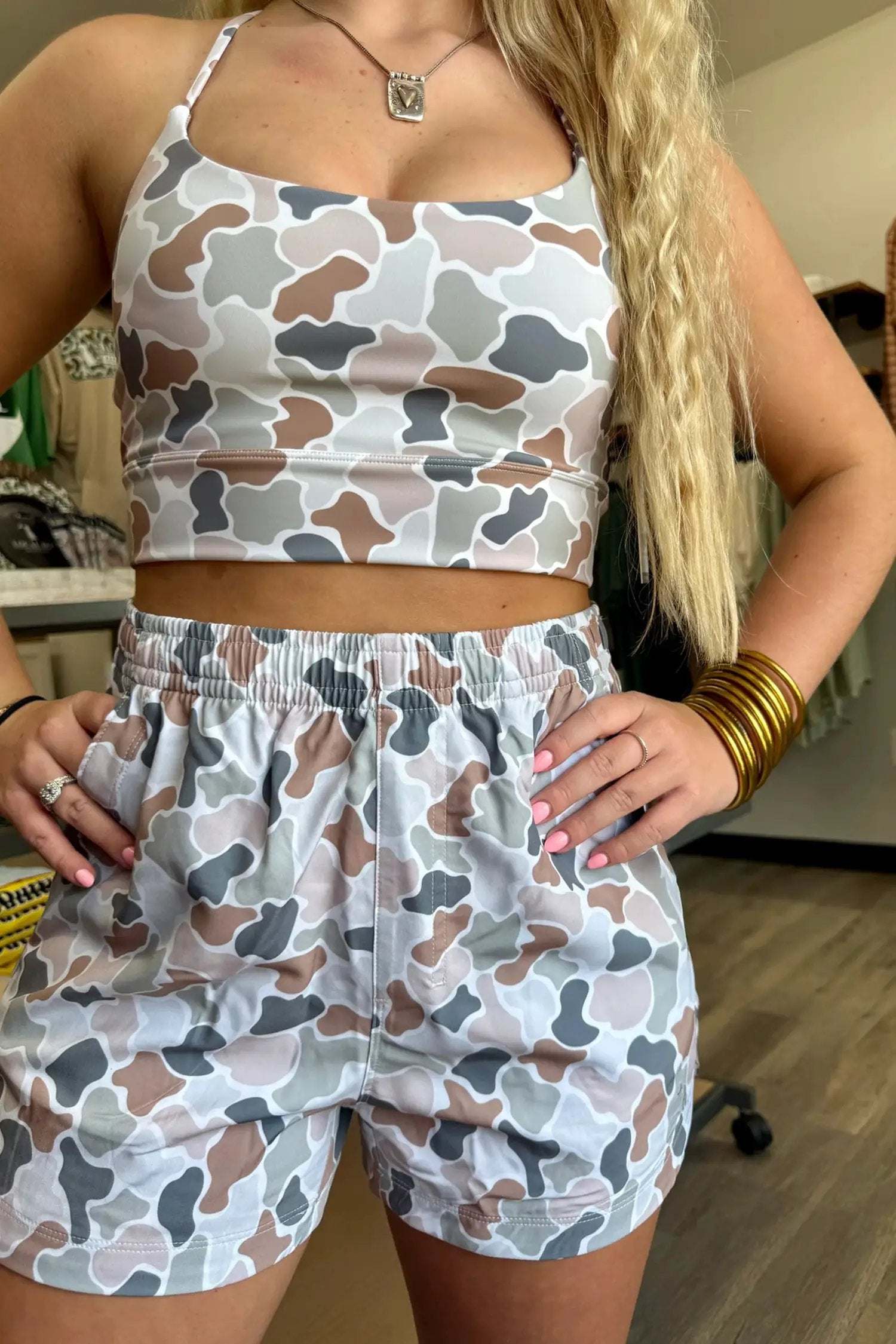 Woman wearing cozy confidence camouflage printed cropped tank and shorts set