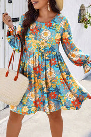 Plus size floral ruffled boho dress with long sleeves and flowy mini length