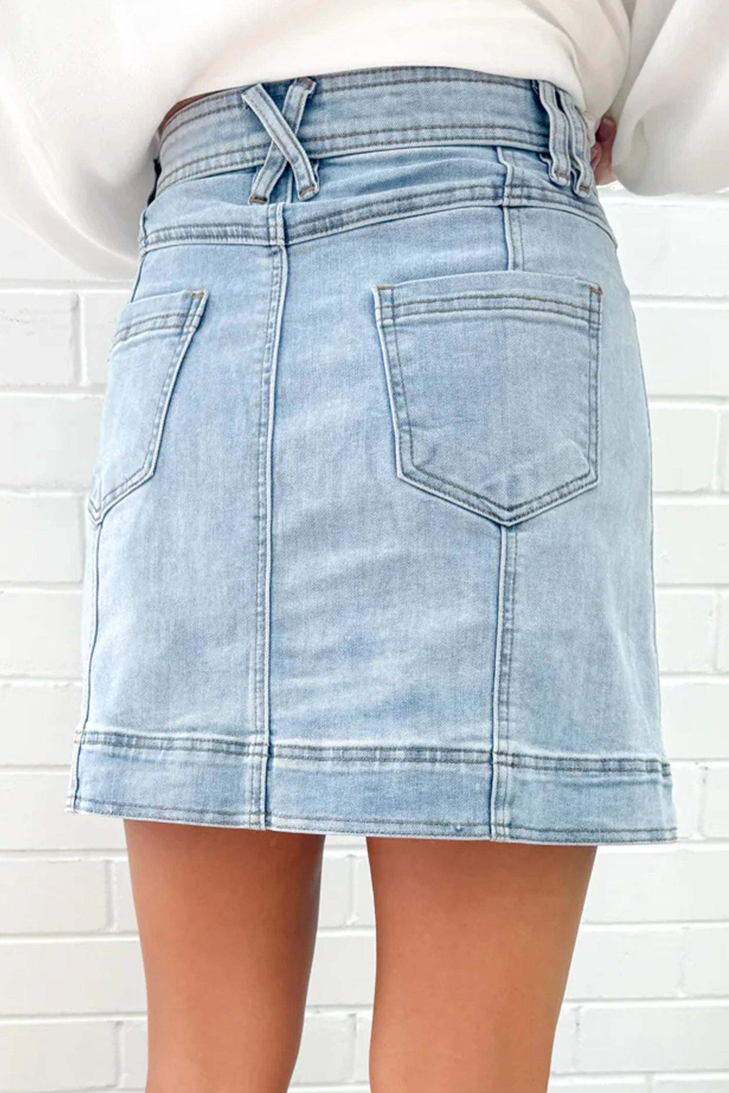 Soft Denim Blue exposed seam detail a-line denim mini skirt with pockets for women casual everyday outfit