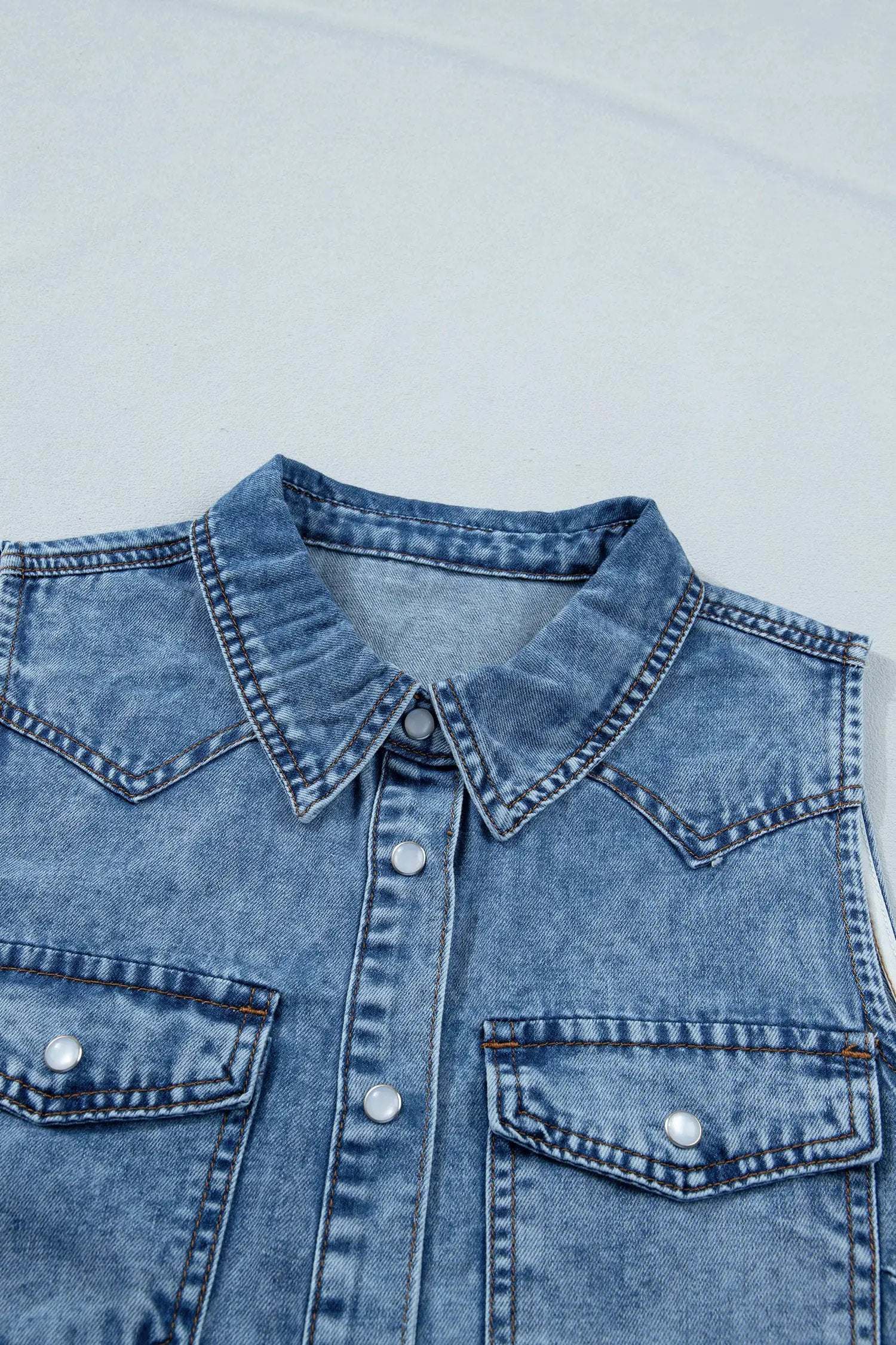 Western Chic sleeveless buttoned front collared denim top in soft blue