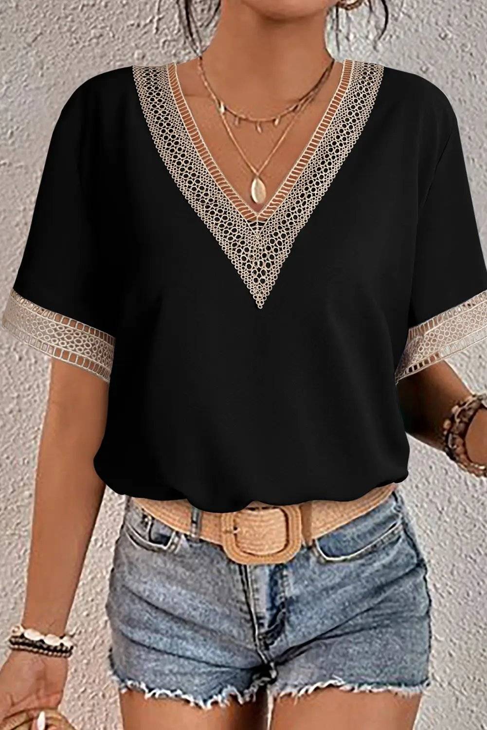 Boho Chic lace trim V-neck blouse with short sleeves and relaxed fit