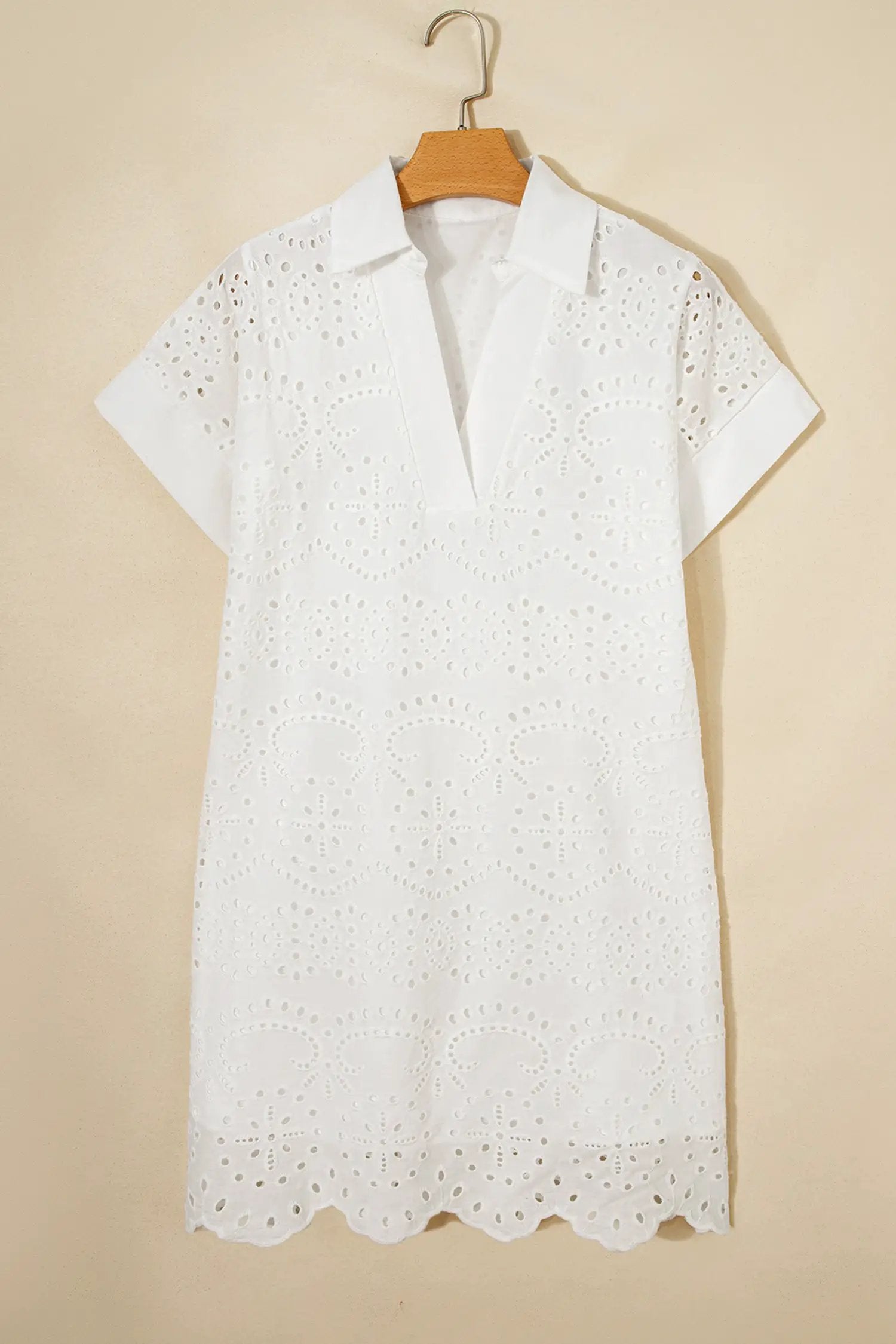 White solid color eyelet embroidered T shirt mini dress with airy texture and relaxed A-line silhouette