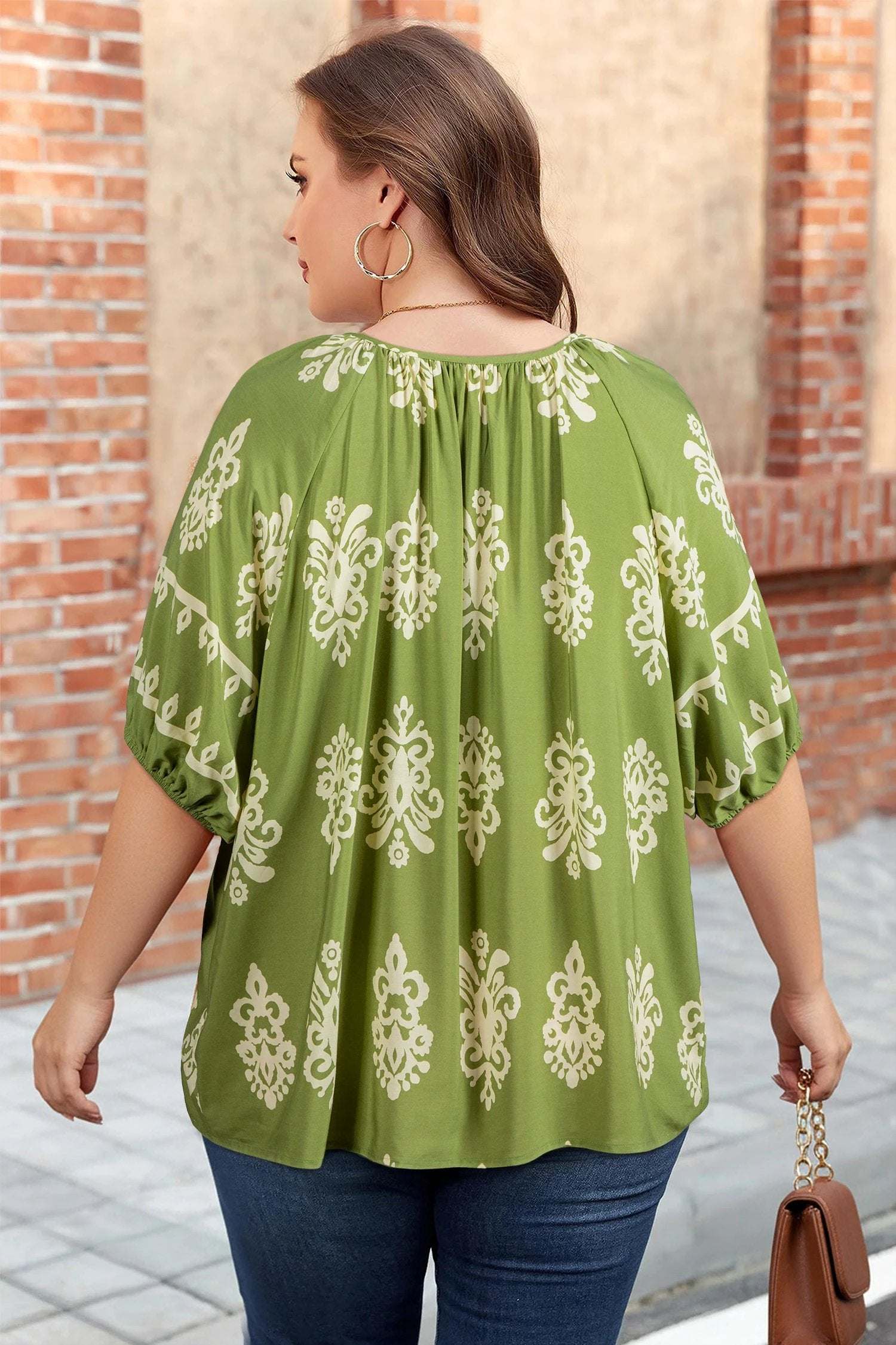 Plus size Effortless Boho floral notched V-neck short sleeve top in emerald green