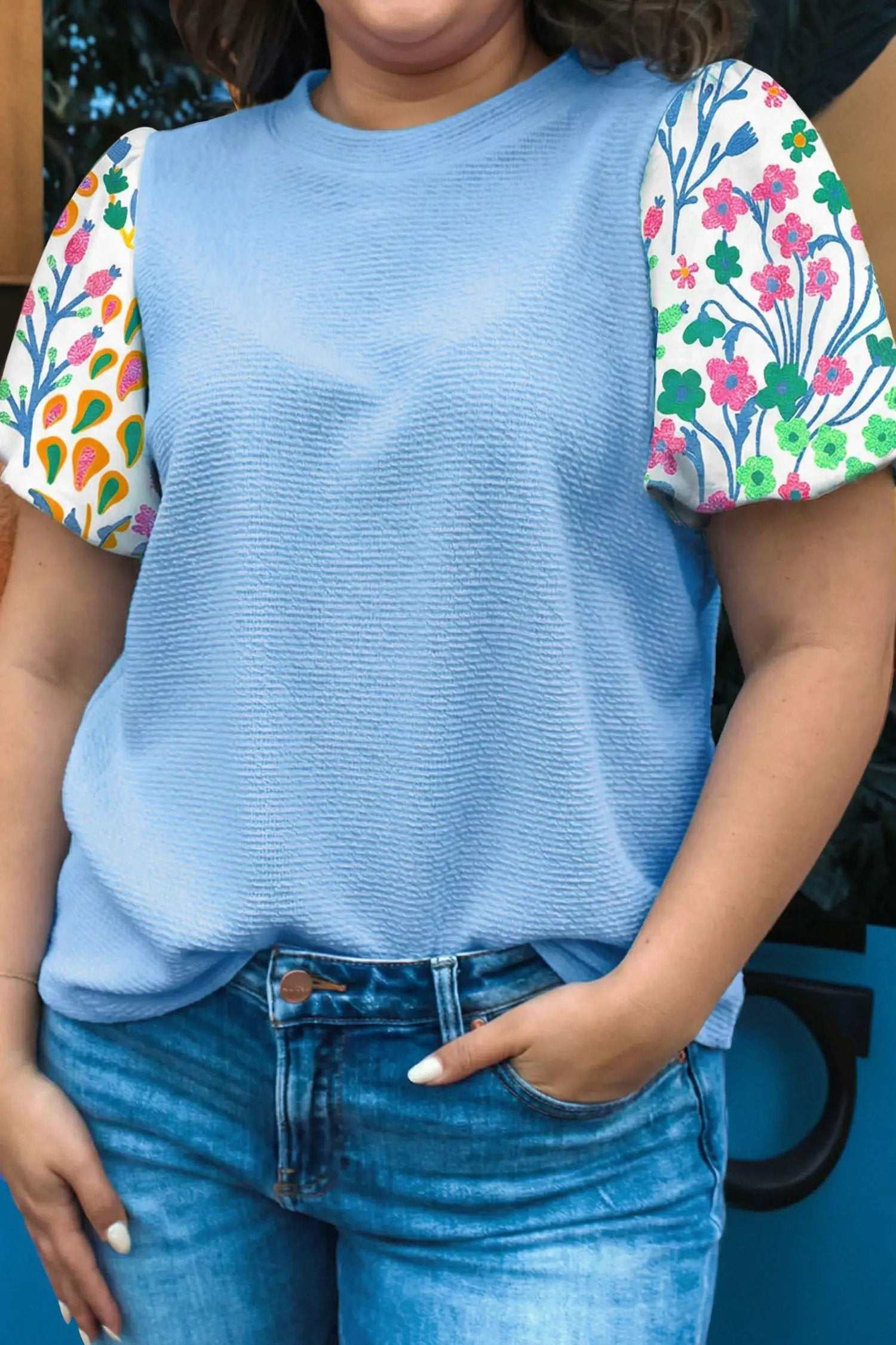 Plus Size Floral Sleeve Top with textured bodice and floral sleeves