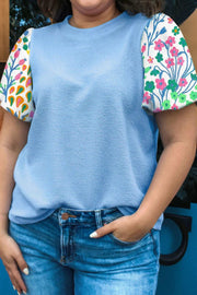 Plus Size Floral Sleeve Top with textured bodice and floral sleeves