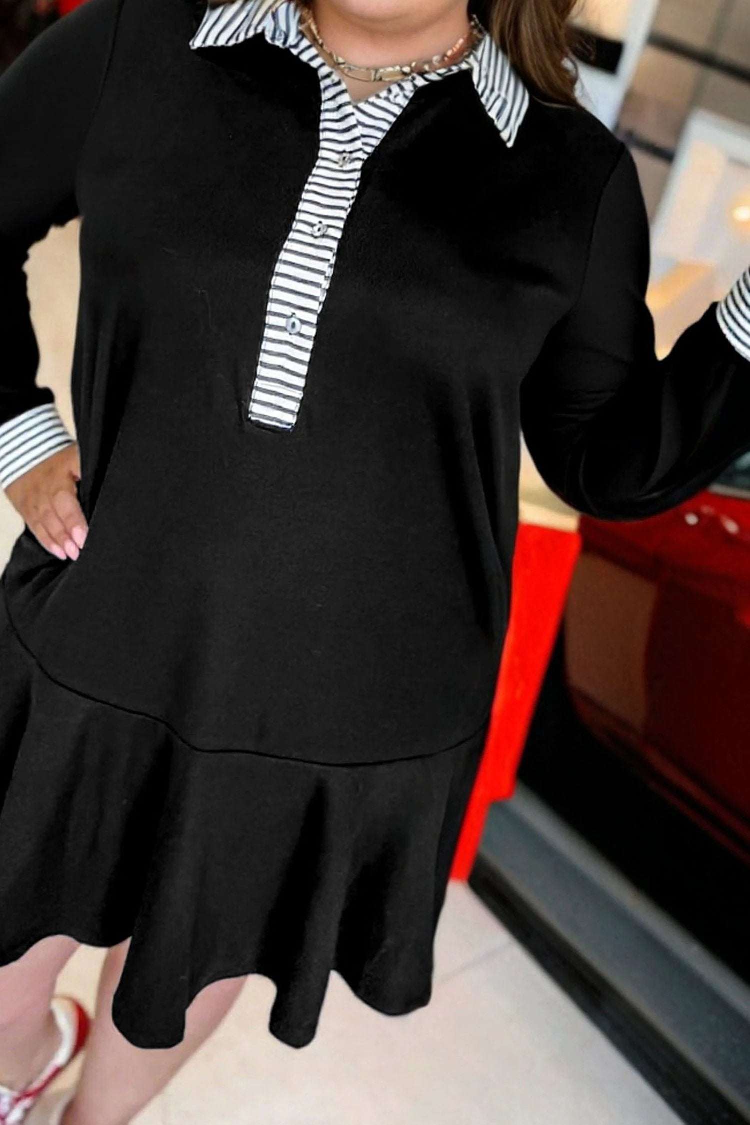 Black plus size polo collar dress with striped cuffs and ruffle hem