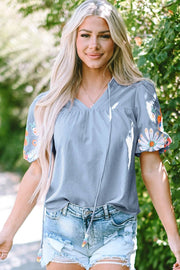 Floral embroidered puff sleeve blouse