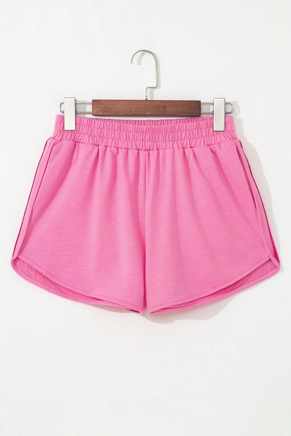 Pink high waist active shorts with color block stripes and elastic waistband