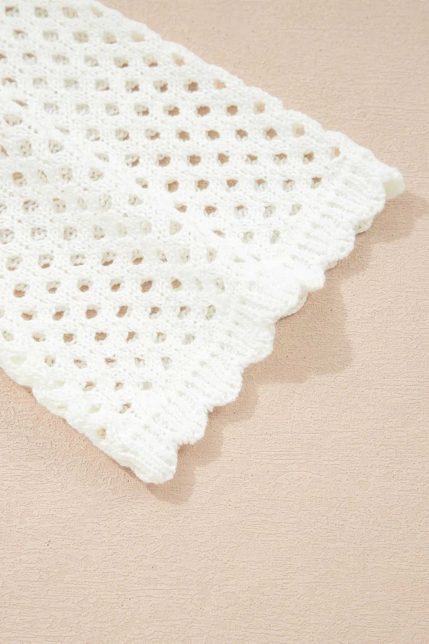 Hollow Out Knit Top with scalloped trim and long sleeves
