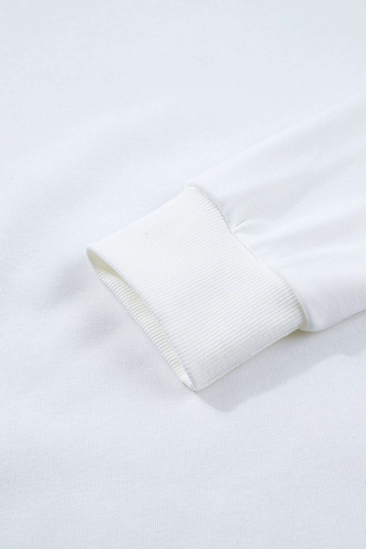 white solid color dropped shoulder long sleeve top for women casual everyday outfit