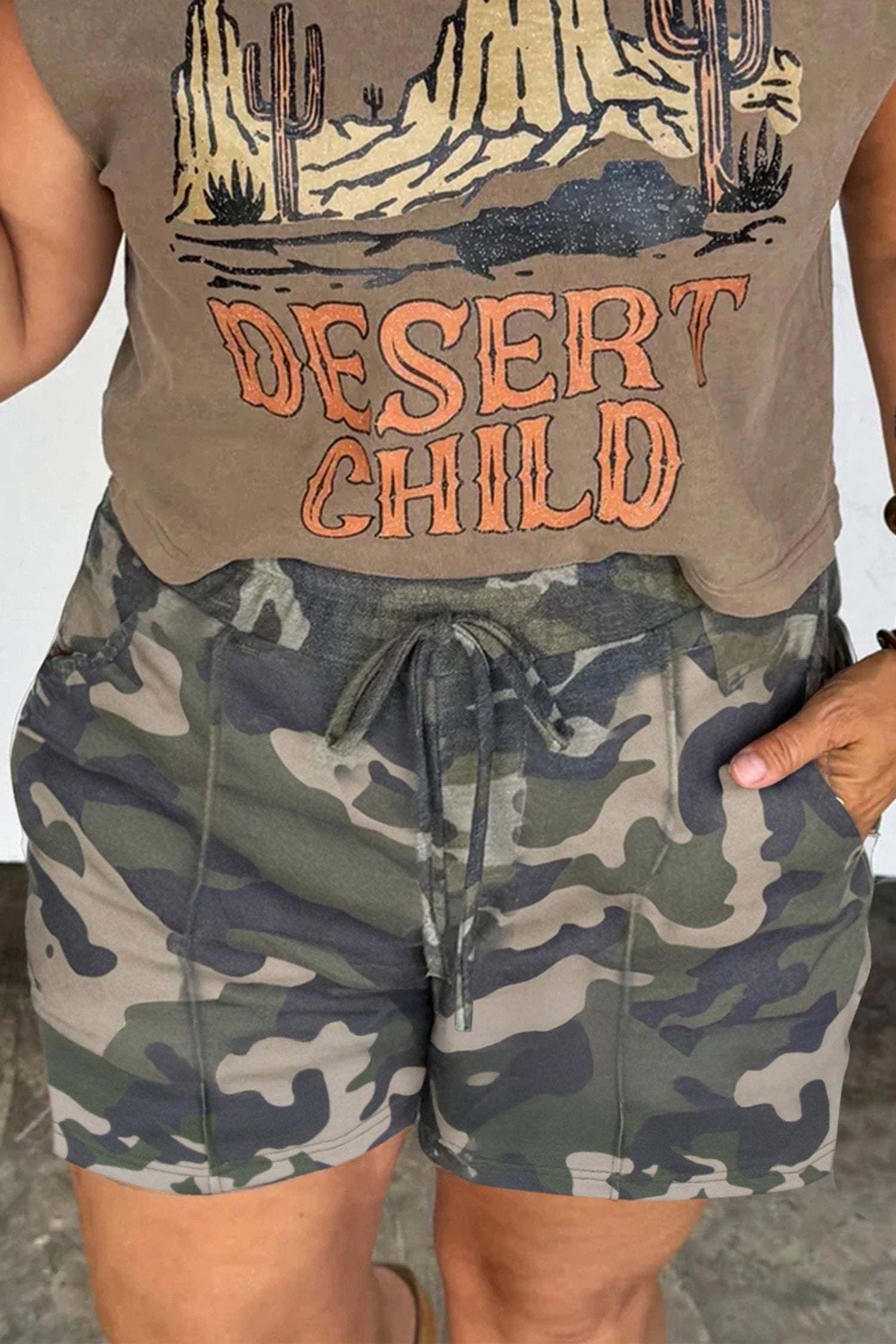 Plus size green camo shorts with tie elastic waist and front pockets for casual weekend vibes