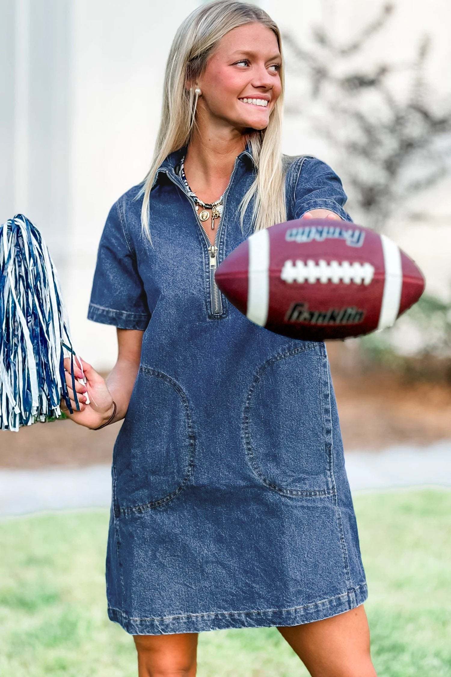 Woman wearing Mom Chic denim zip-front collared mini dress with short sleeves