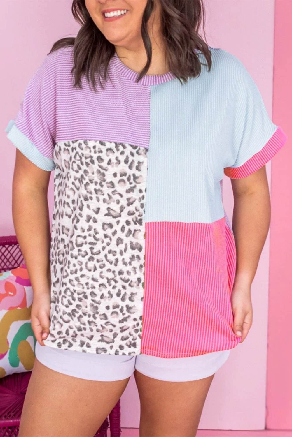 Plus size patchwork leopard corded knit tee with colorblock panels and relaxed fit
