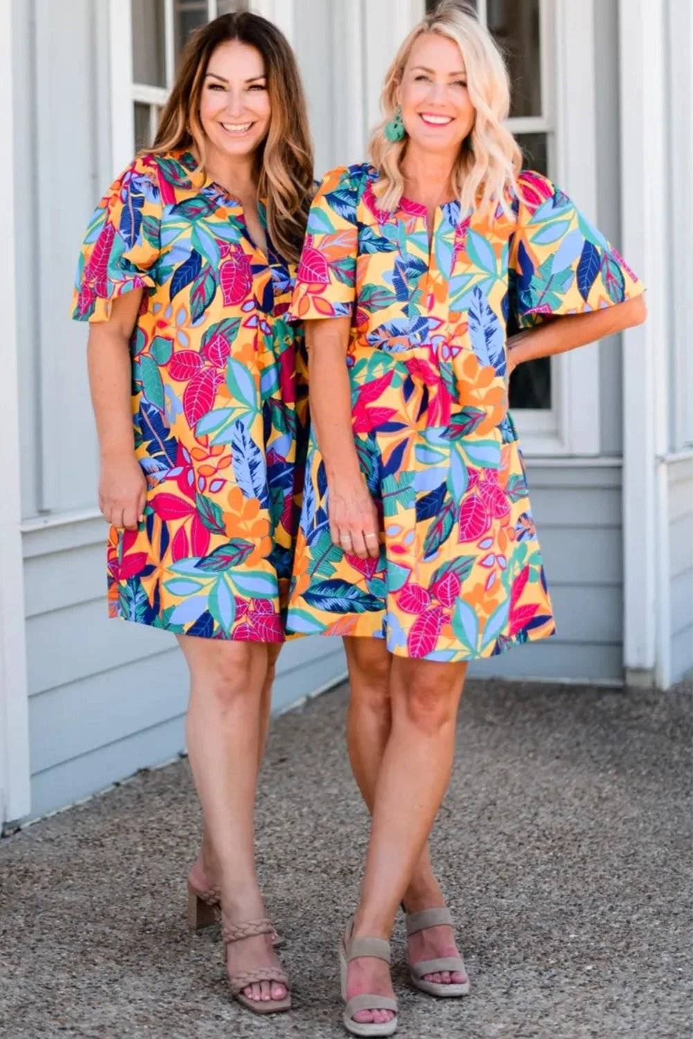 Plus size leafy print split-neck short-sleeve shift dress perfect for Sunday ready casual wear