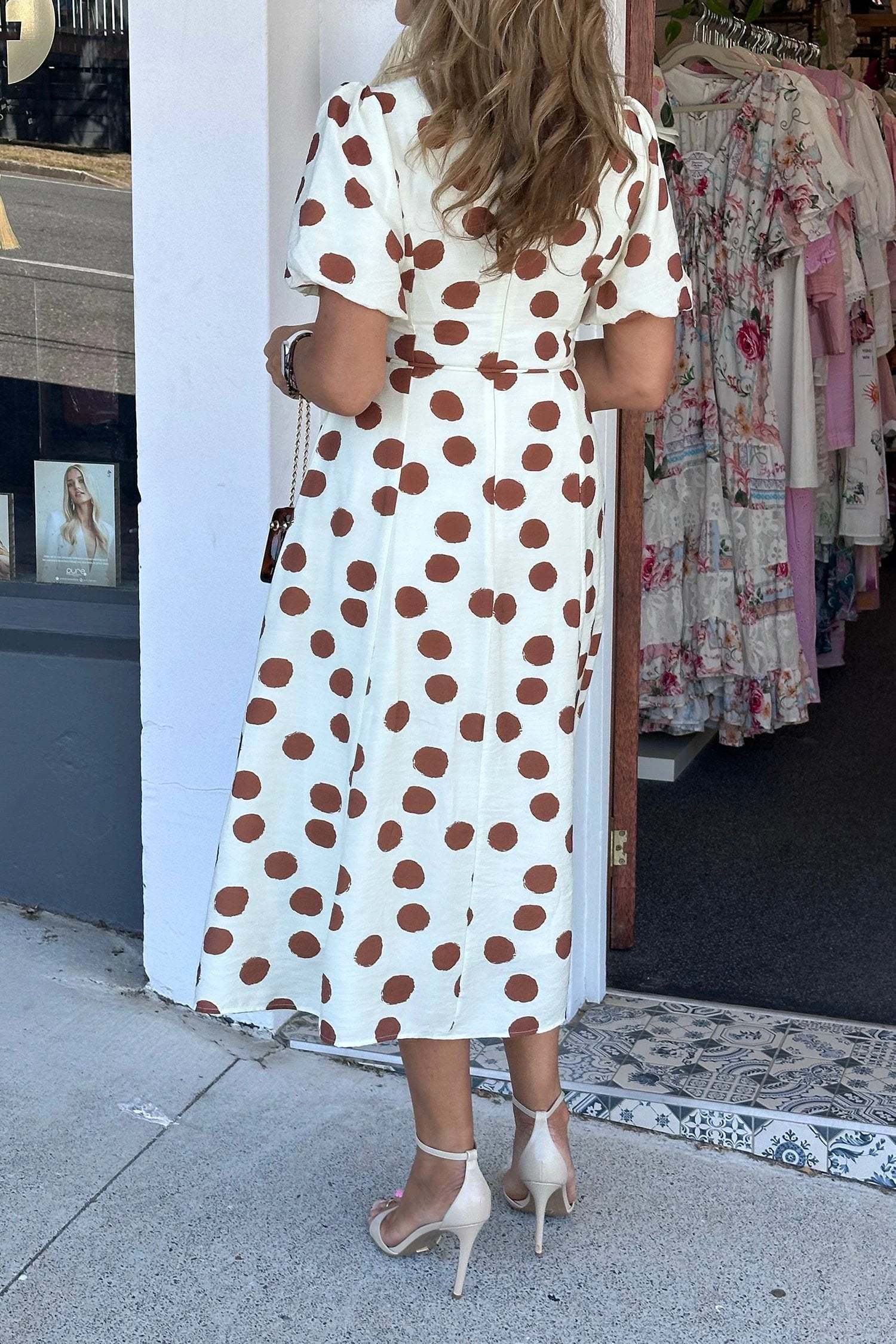 White midi dress with warm brown polka dots, V-neck, short sleeves, and tie waist Polka Dot Daydream design