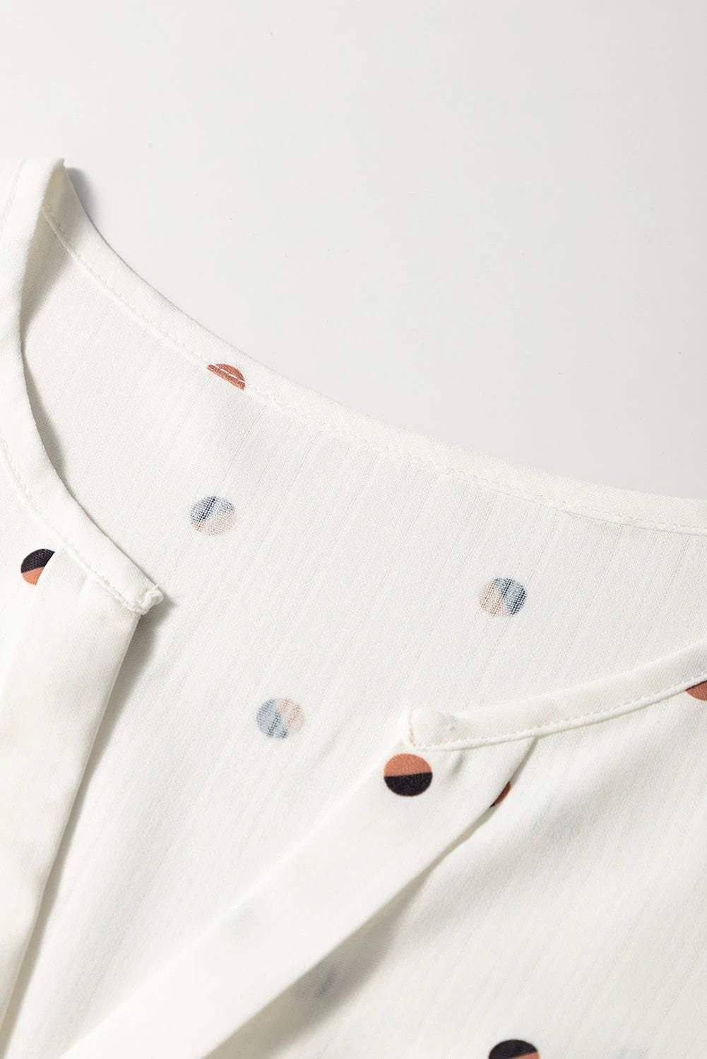 Lightweight Polka Dot Day Dream V-neck tank top with ruffled shoulders