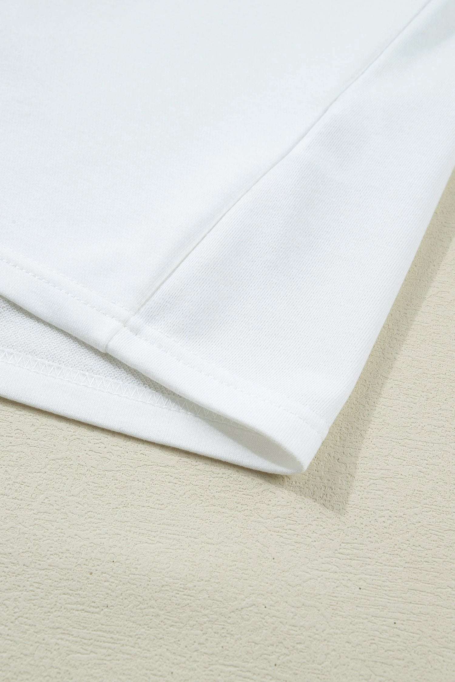 white solid color dropped shoulder long sleeve top for women casual everyday outfit