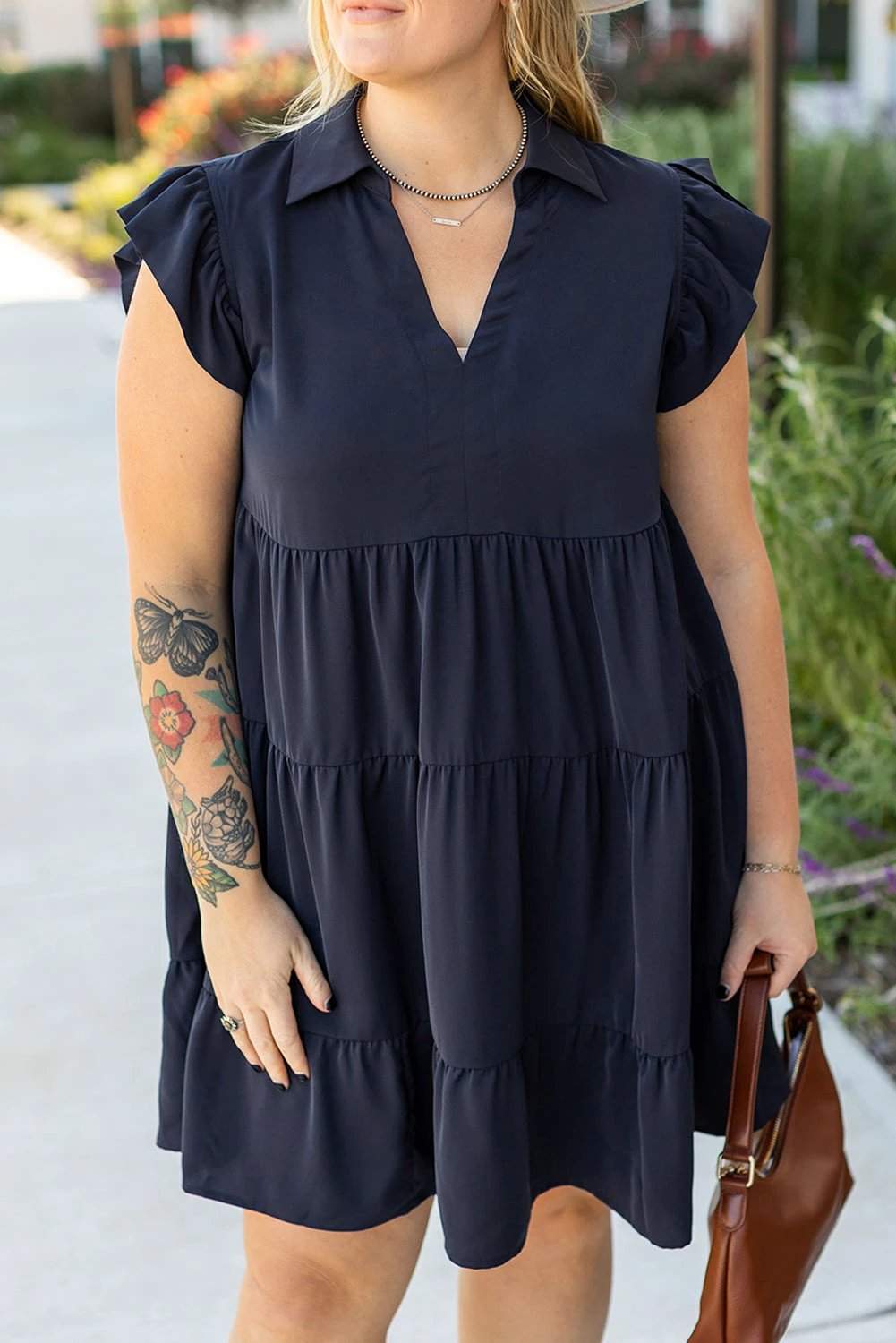 Plus size collared V-neck flutter sleeve navy dress with tiered skirt