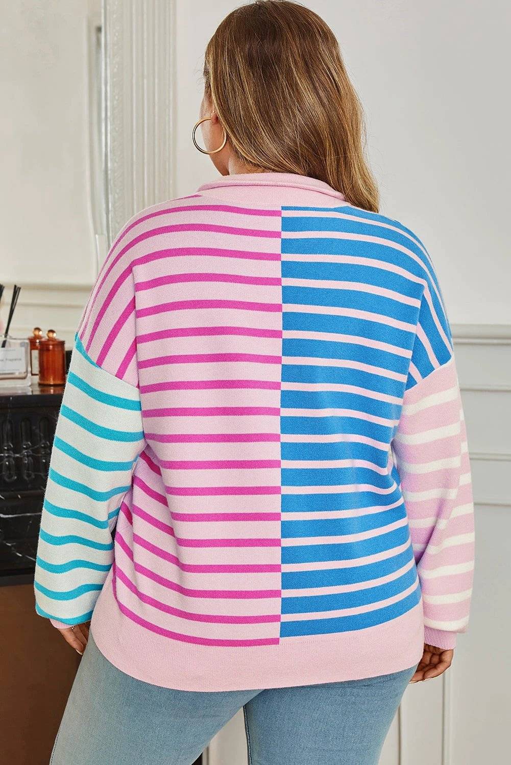 Plus size striped colorblock half zip sweater in pastel pink, blue, and white with relaxed fit and ribbed cuffs