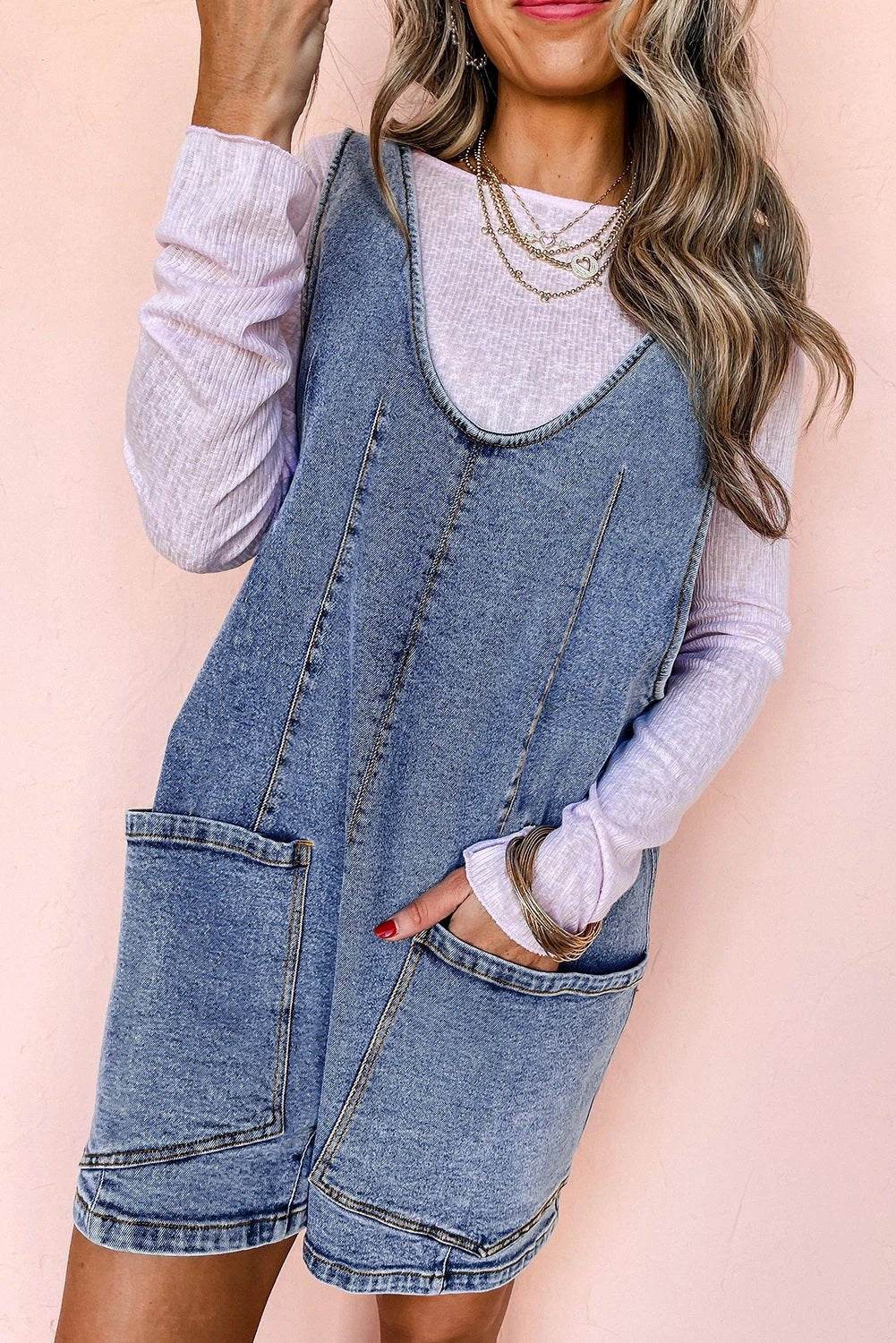 Mom Chic sleeveless denim romper with U-neck and patch pockets for casual stylish wear