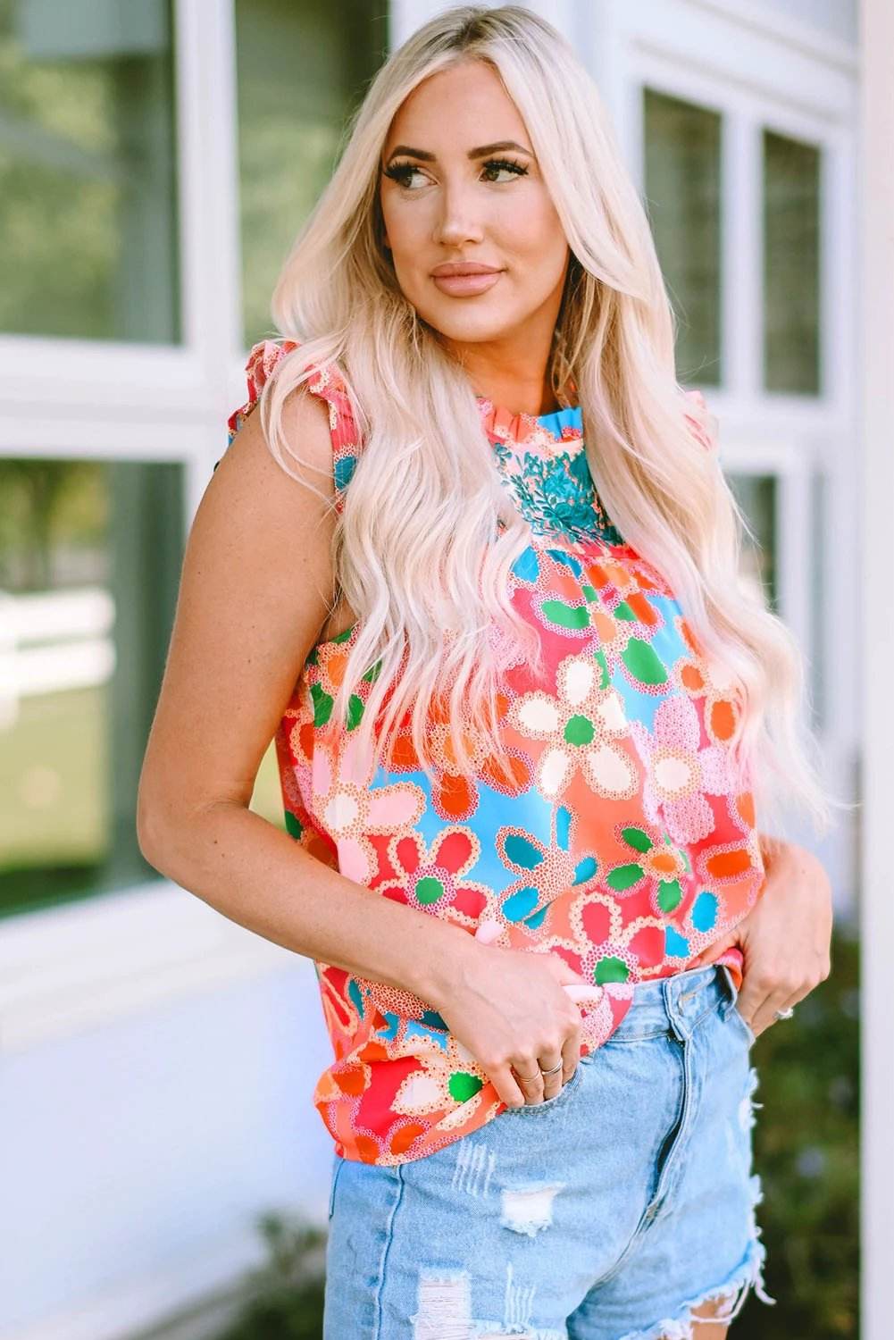 Pink embroidered floral print tank top with ruffle trim and sleeveless design