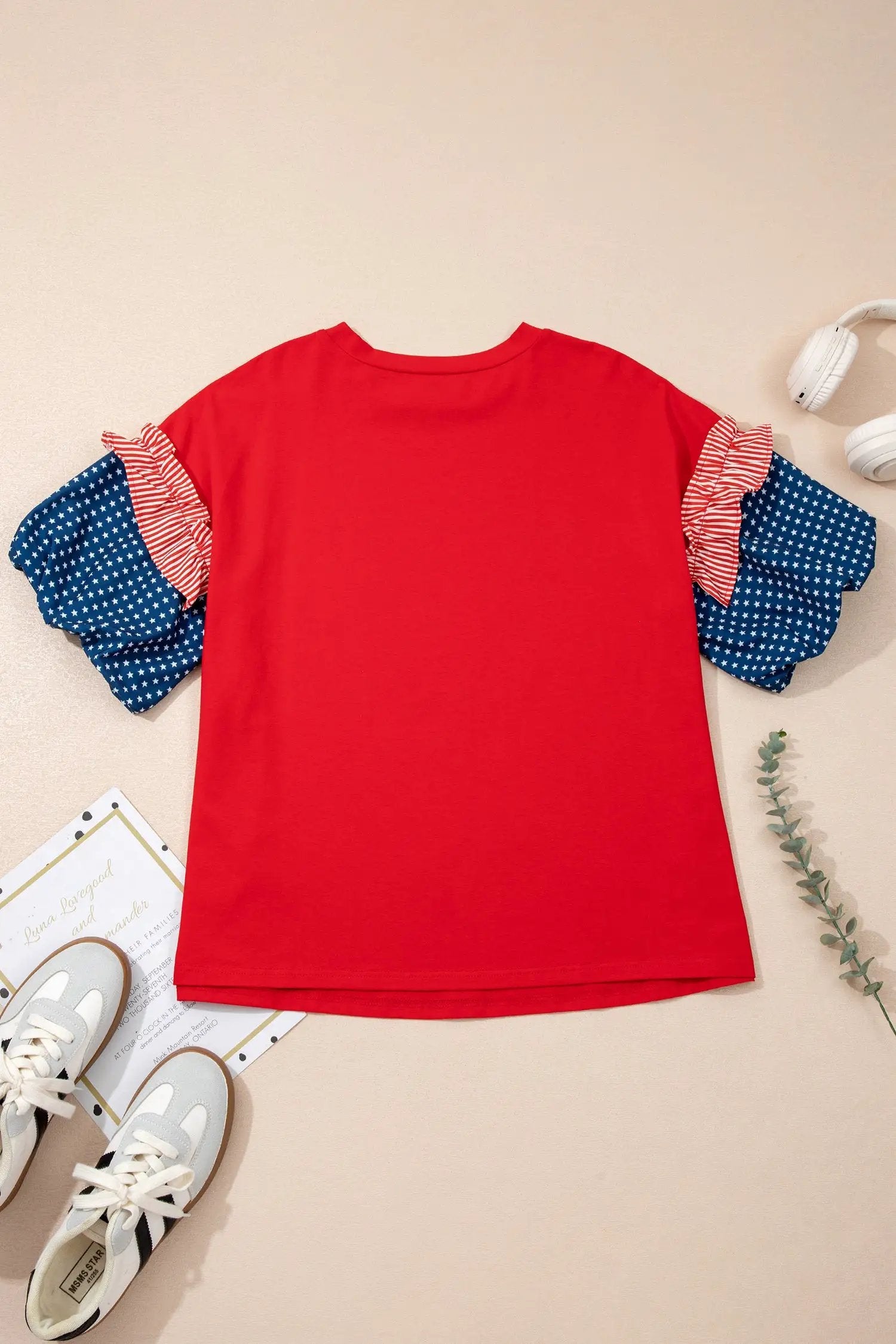 Fiery red plus size top with patchwork star and striped ruffle bubble sleeves