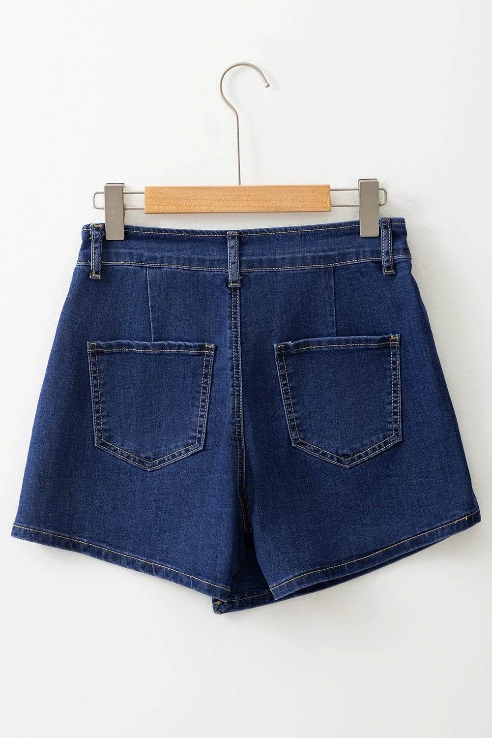 bluing asymmetric wrapped buttoned high waist denim shorts for women casual everyday outfit