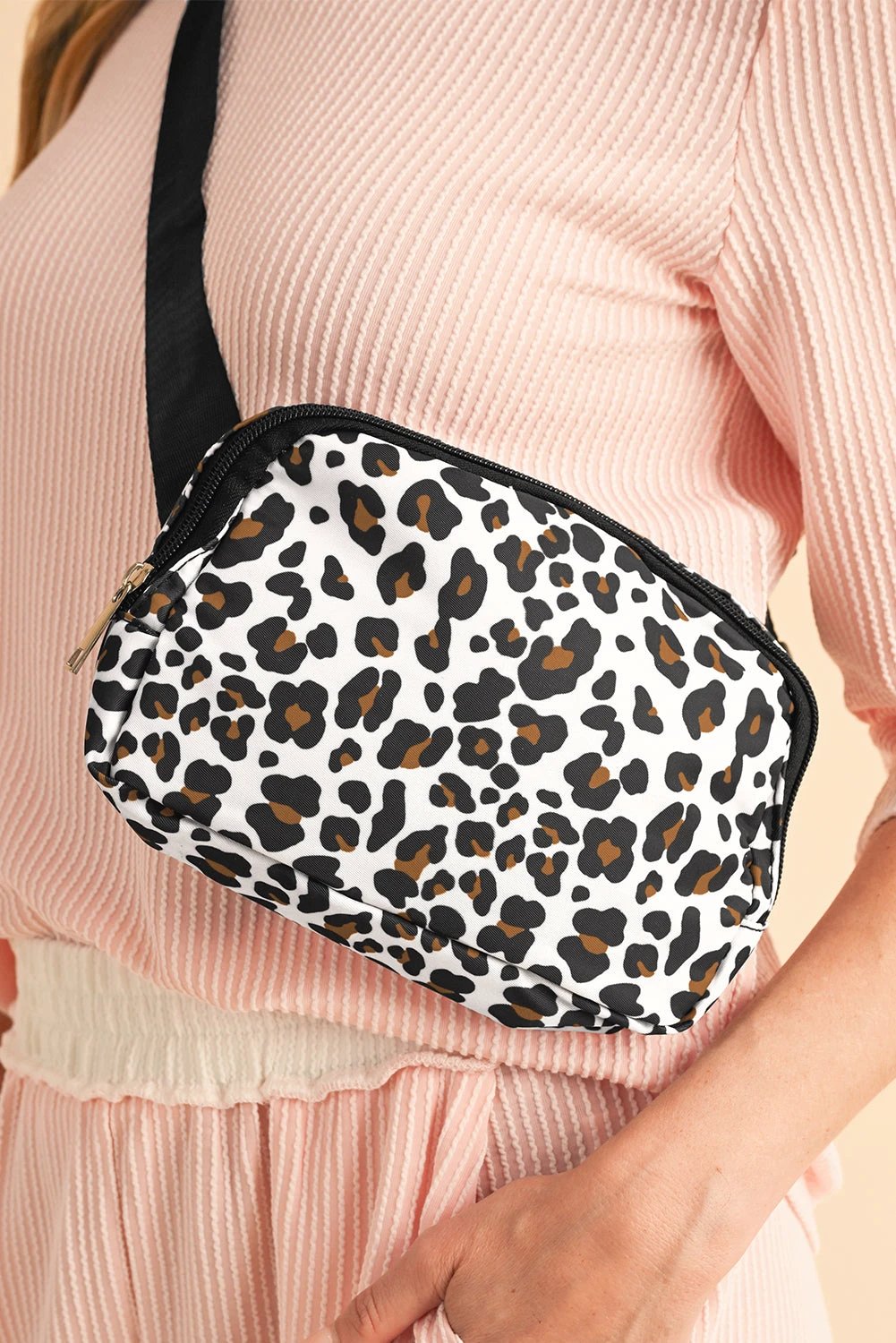 White cheetah print zipped crossbody bag with multi compartments for organized daily use