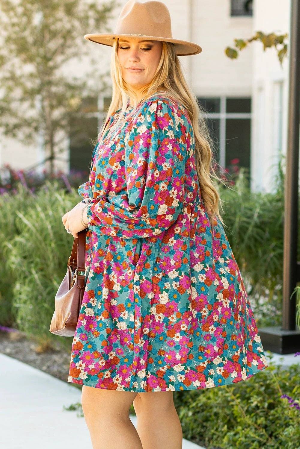 Plus size floral shirred ruffle tiered mini dress with lightweight fabric and flattering silhouette