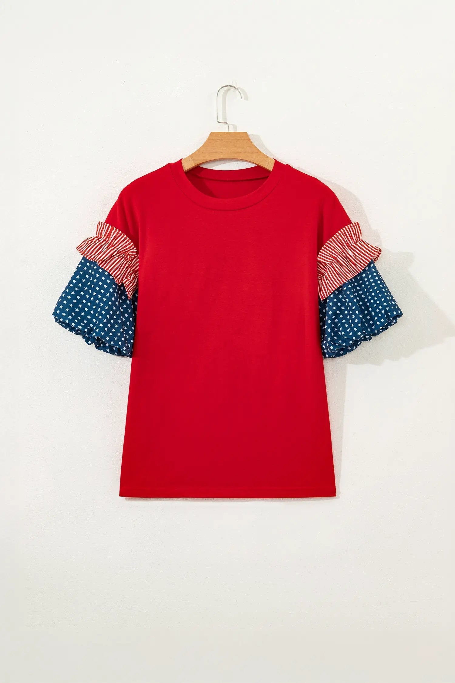 Sky-blue puff sleeve top with fiery red stars stripes and American flag print patriotic design