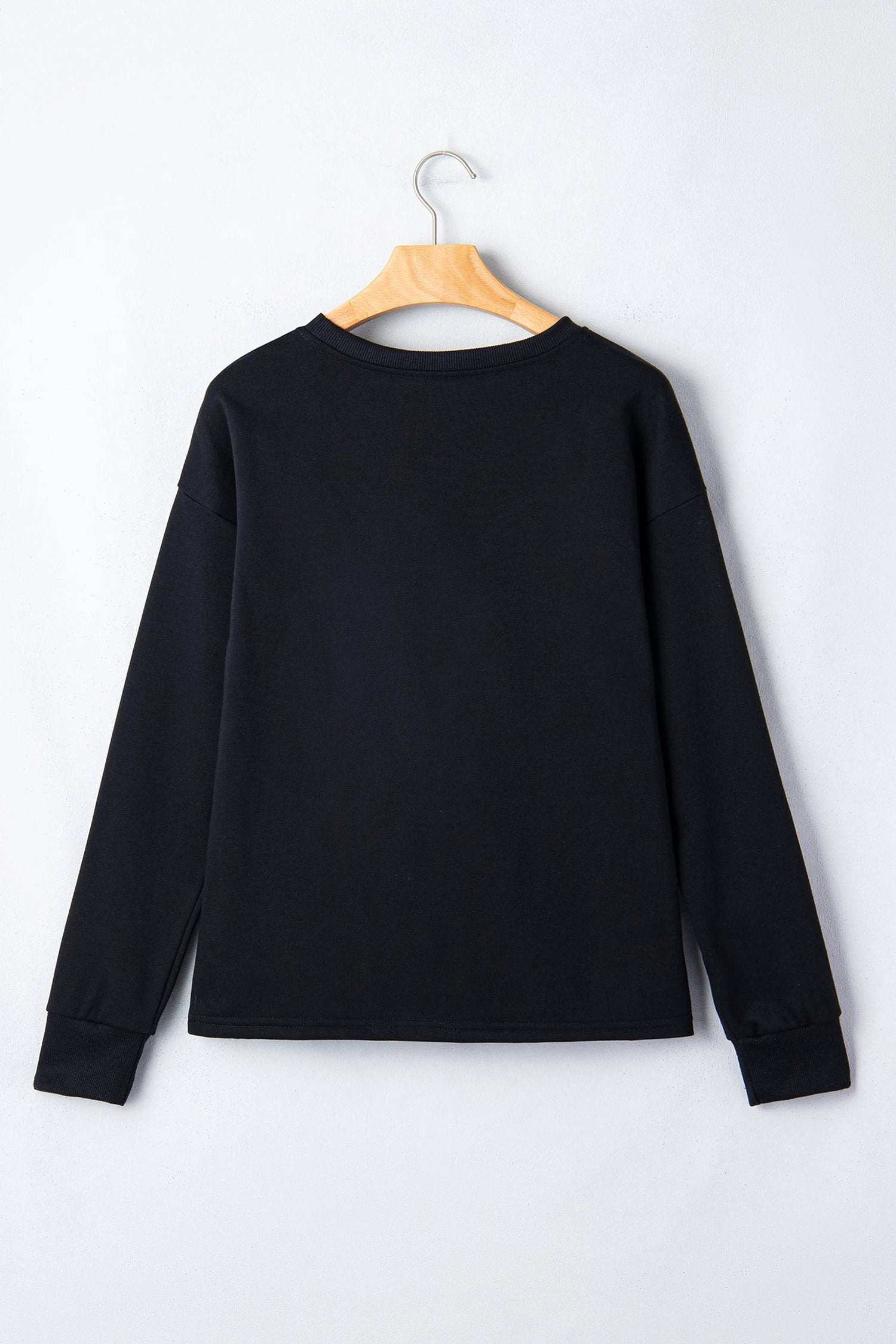 white solid color dropped shoulder long sleeve top for women casual everyday outfit