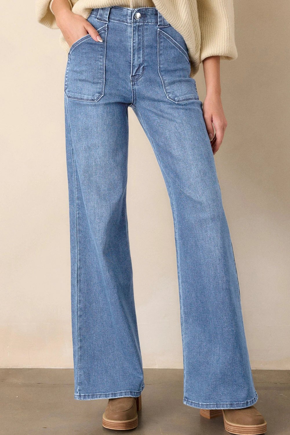 Dirty blue mid-rise straight-leg Chic Mom jeans with classic five-pocket styling and durable denim fabric