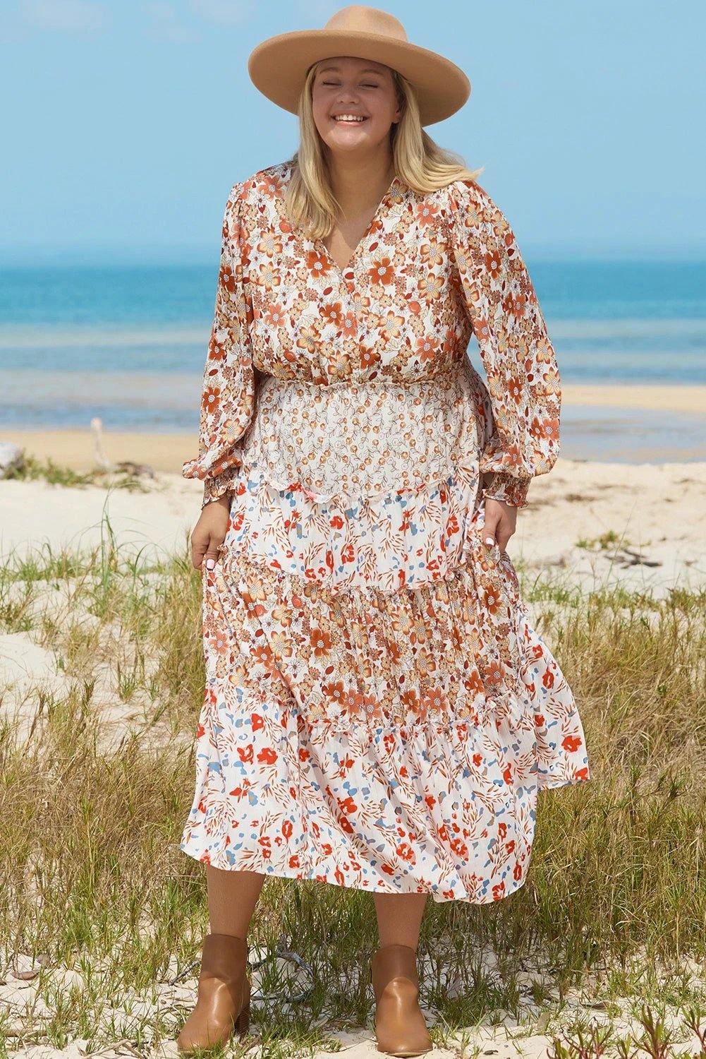 Plus size boho floral tiered ruffle maxi dress with long sleeves and flowing silhouette featuring main character energy style