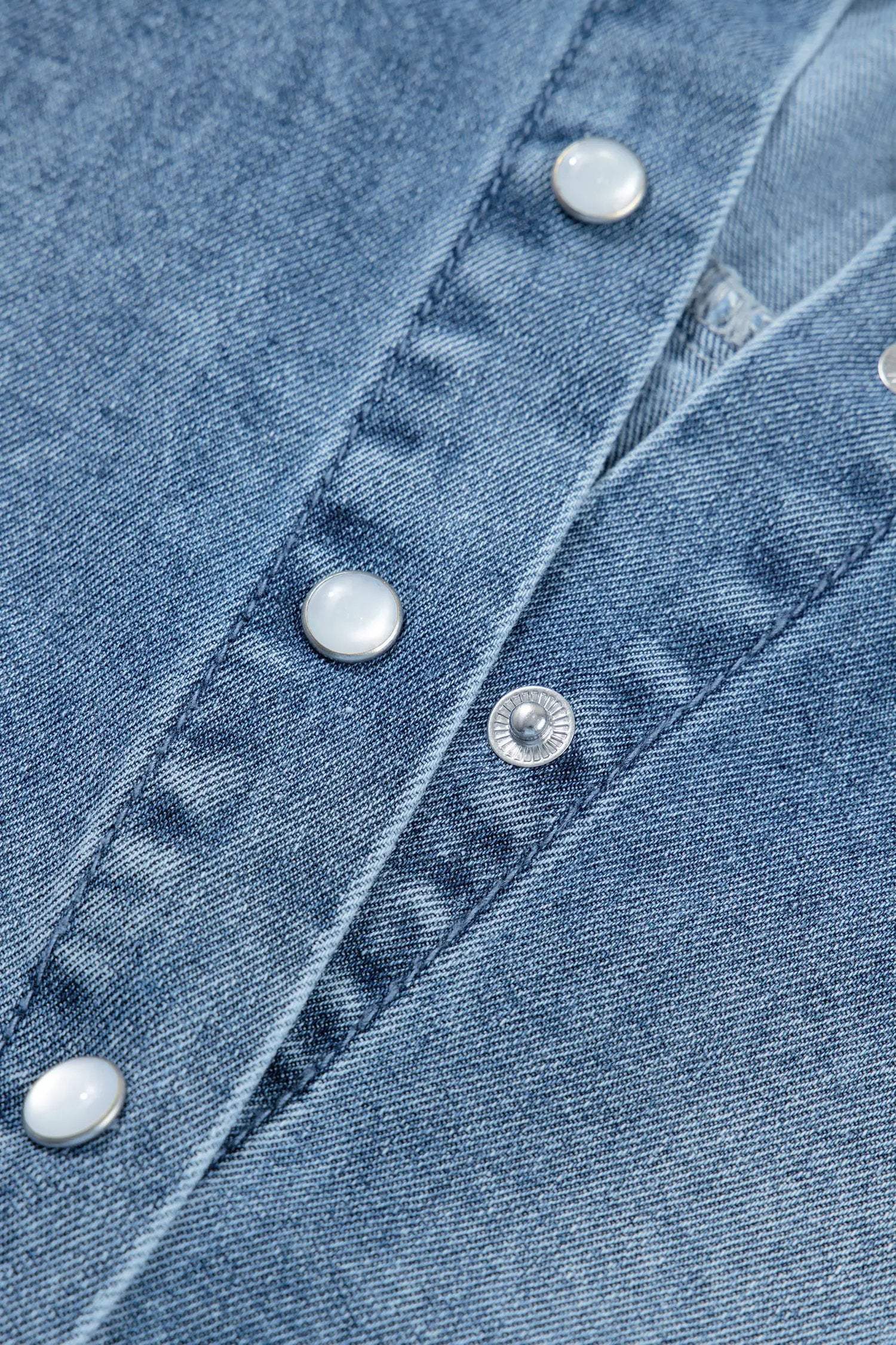 Blue denim Western Chic short sleeve shirt with frilled puff sleeves and snap buttons