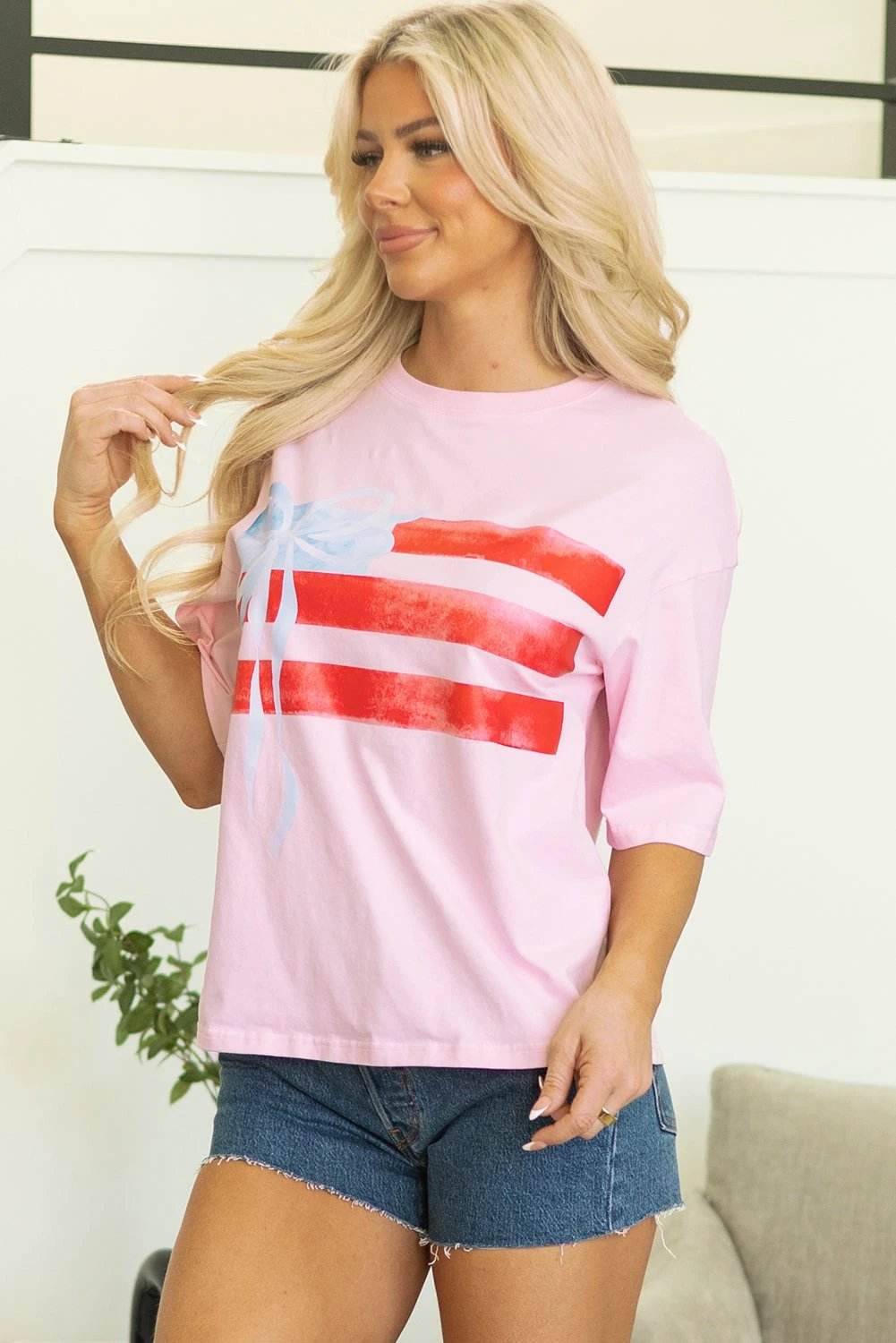 light pink flag bow graphic crewneck tee for women casual everyday outfit