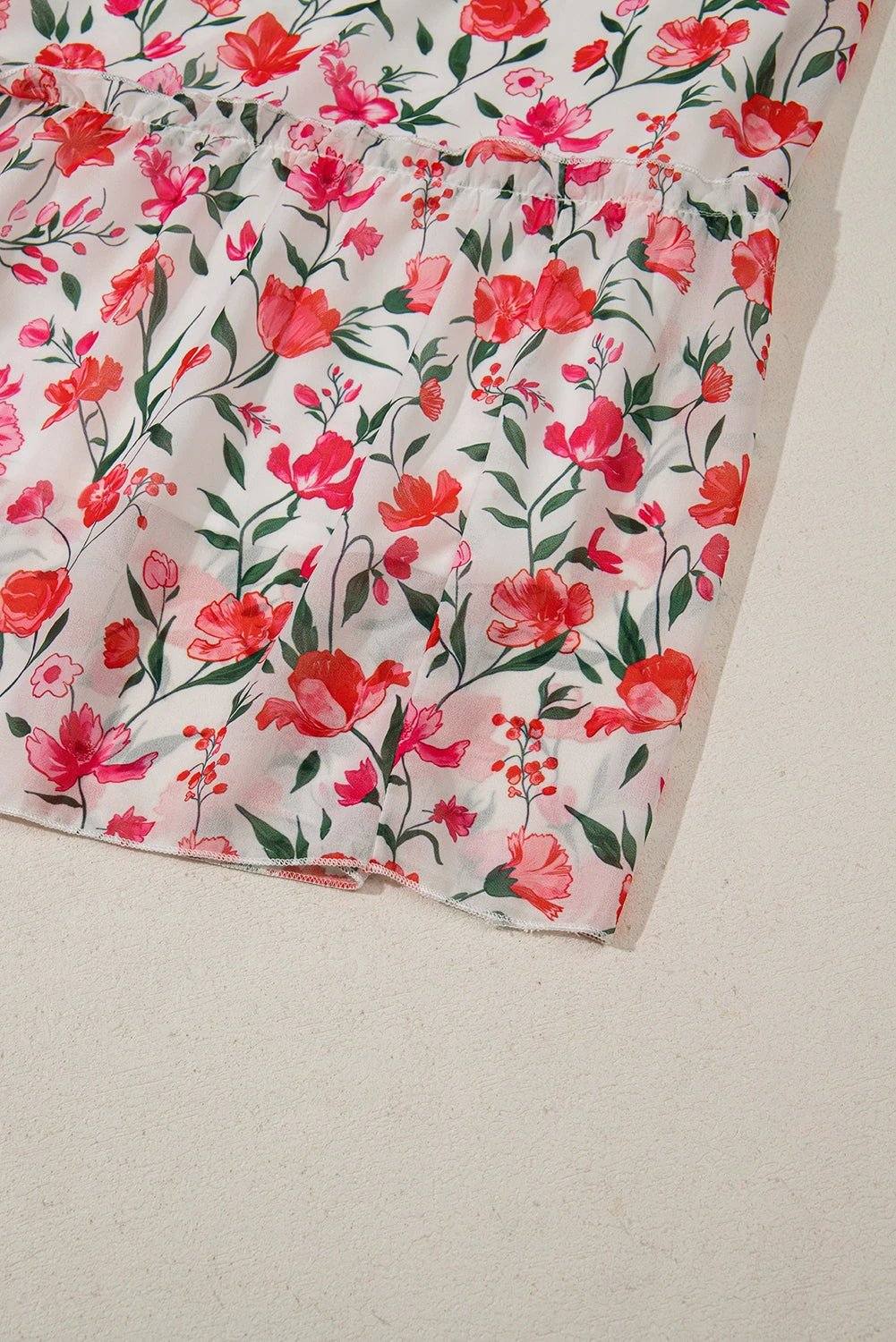 Plus size pink floral maxi dress with square neck and puff sleeves for garden parties