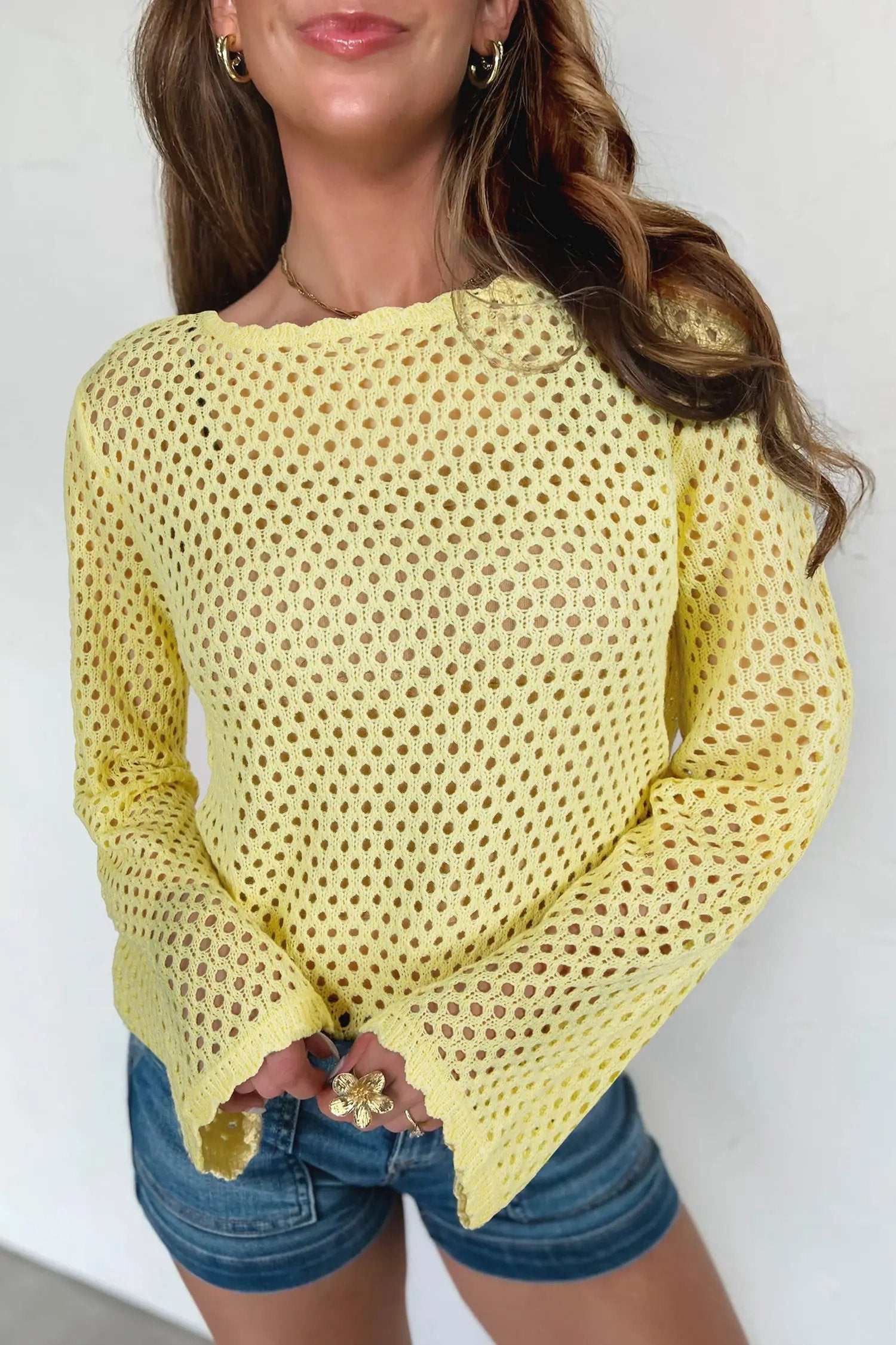 Hollow Out Knit Top with scalloped trim and long sleeves