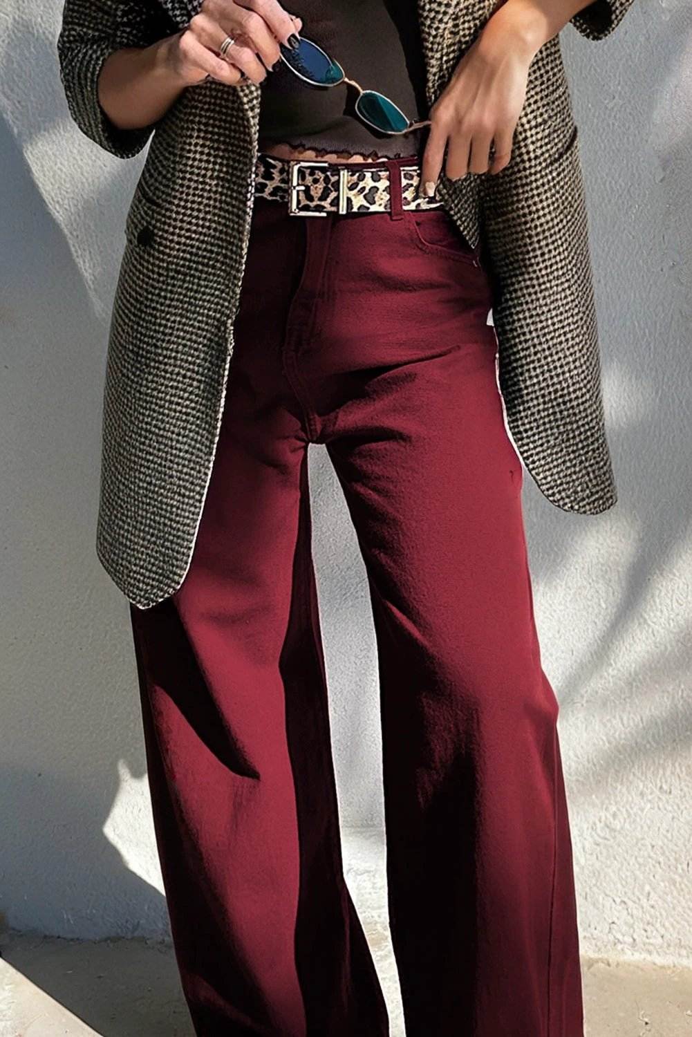 High waist loose straight jeans in rich hue styled for casual chic look