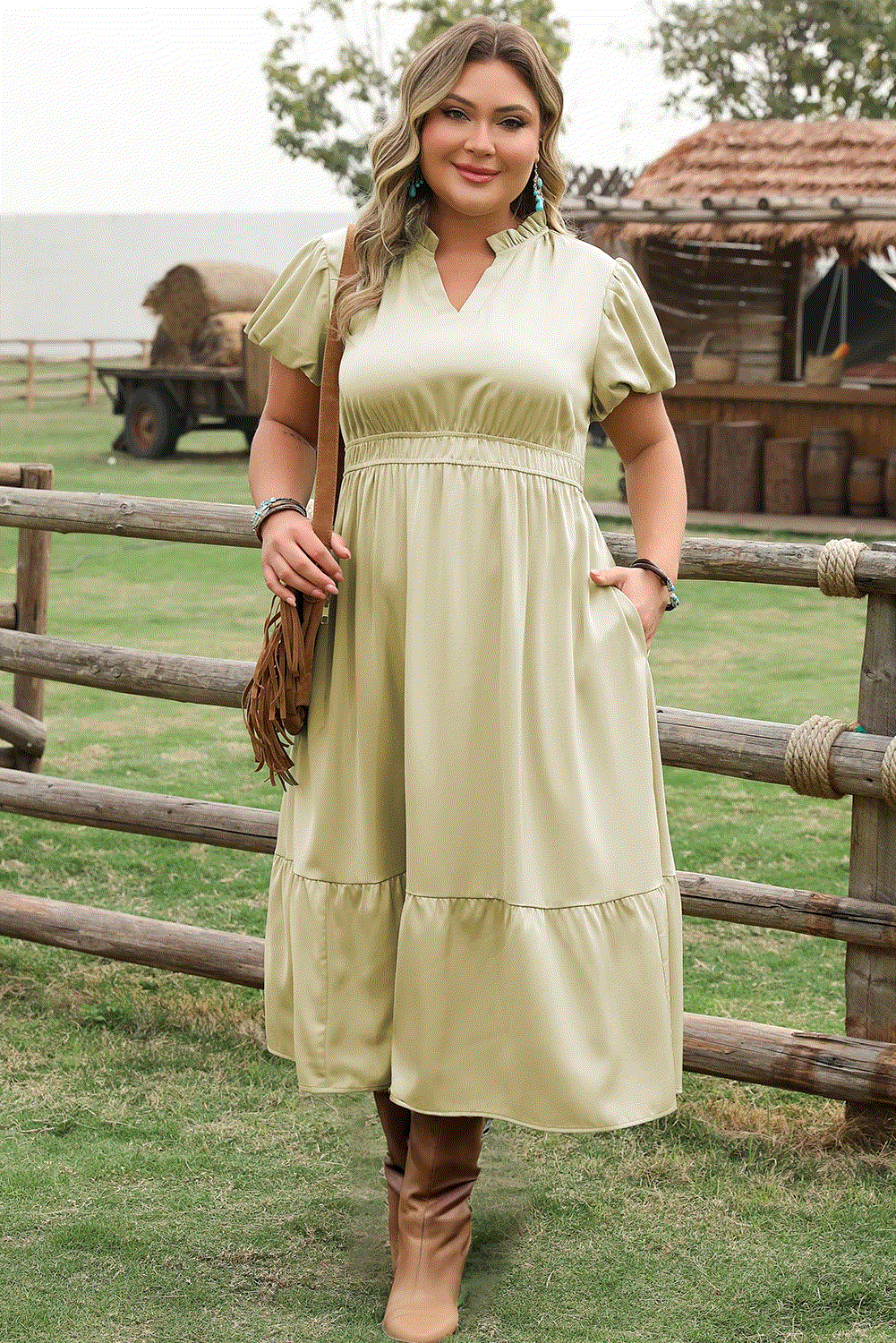 Plus size notched v-neck maxi dress with puff sleeves and tiered skirt in satin fabric