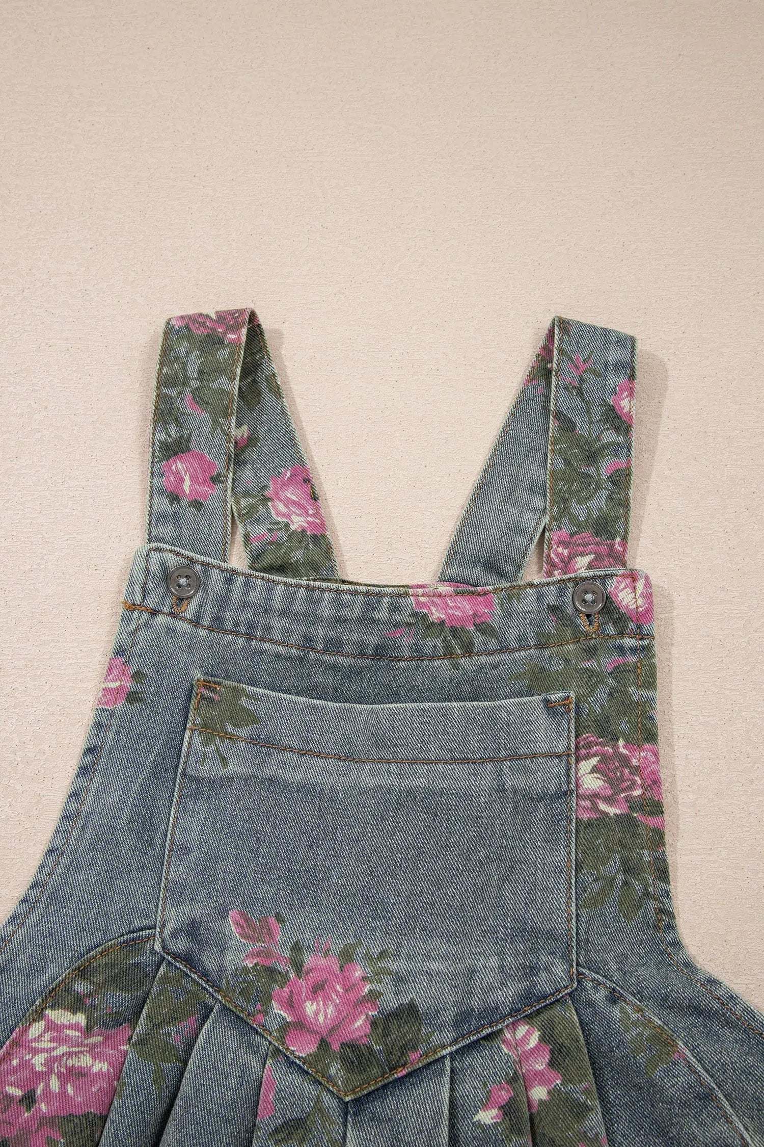 Floral Denim Jumpsuit with pleated high-waist and wide-leg silhouette