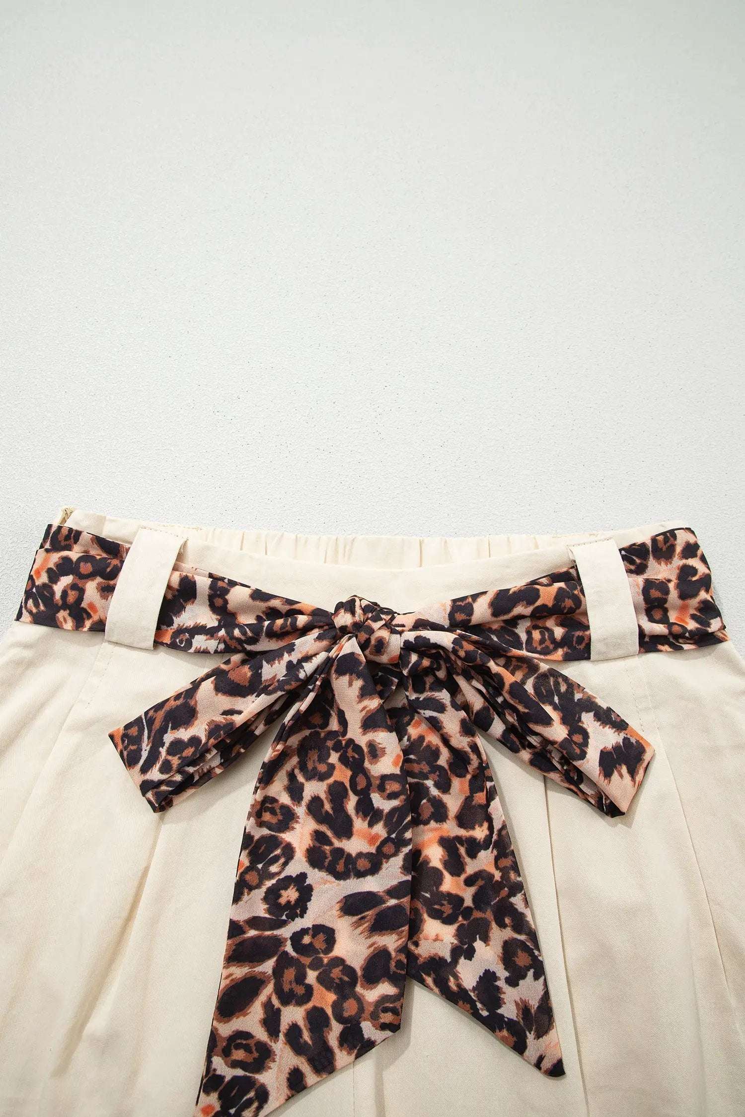 Pink pleated wide leg shorts with leopard contrast sash belt, Weekend Vibe style