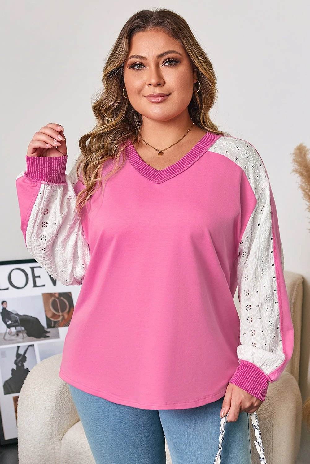Plus size V-neck top with lace stripe sleeves and corded trim on soft knit fabric
