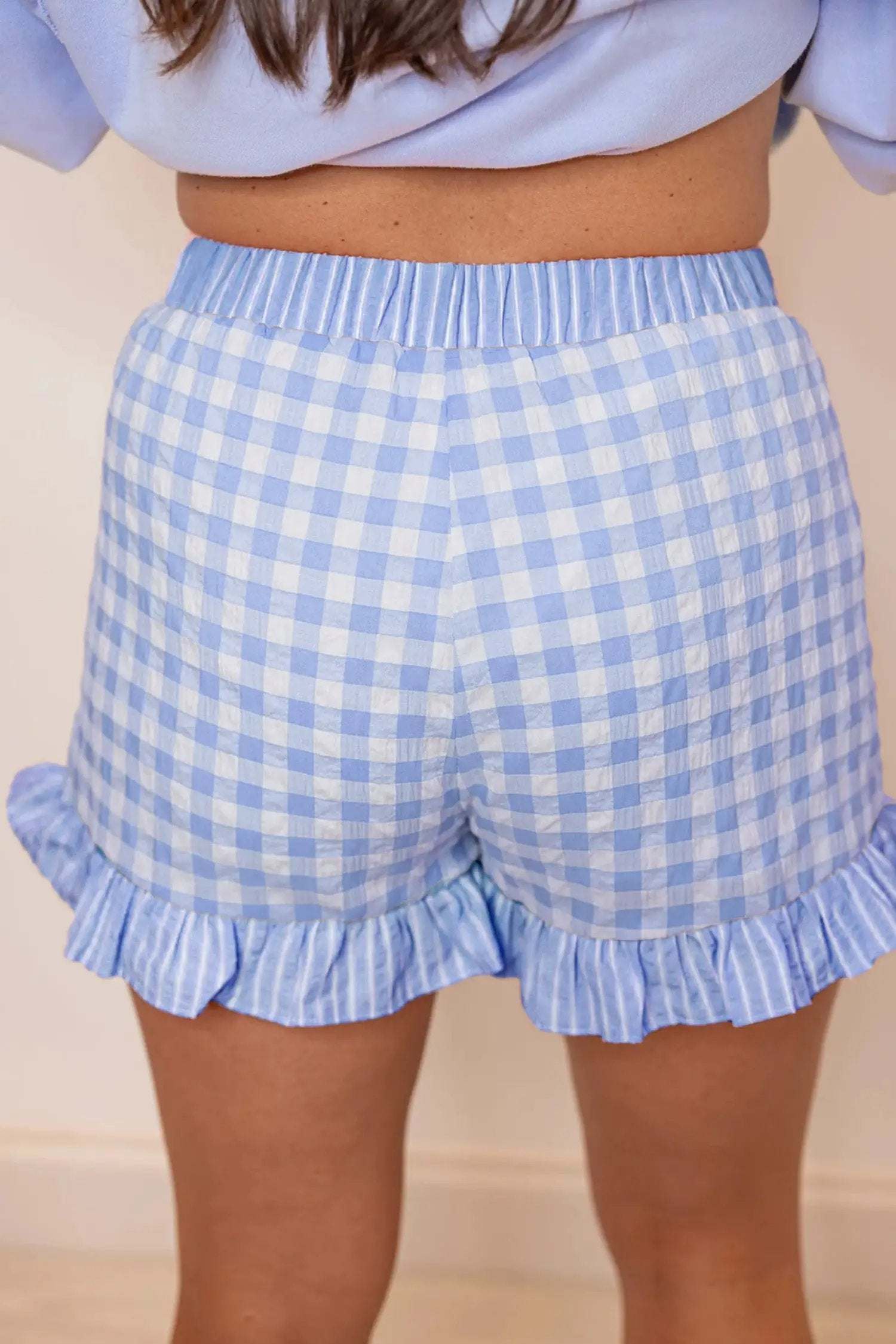 Women’s gingham ruffle hem shorts with lace tie waist and elastic back waistband for casual weekend wear