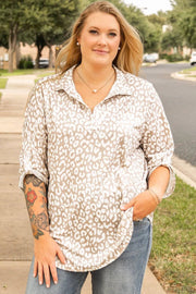 Plus size leopard print blouse with tab sleeves and V-neck for casual chic style