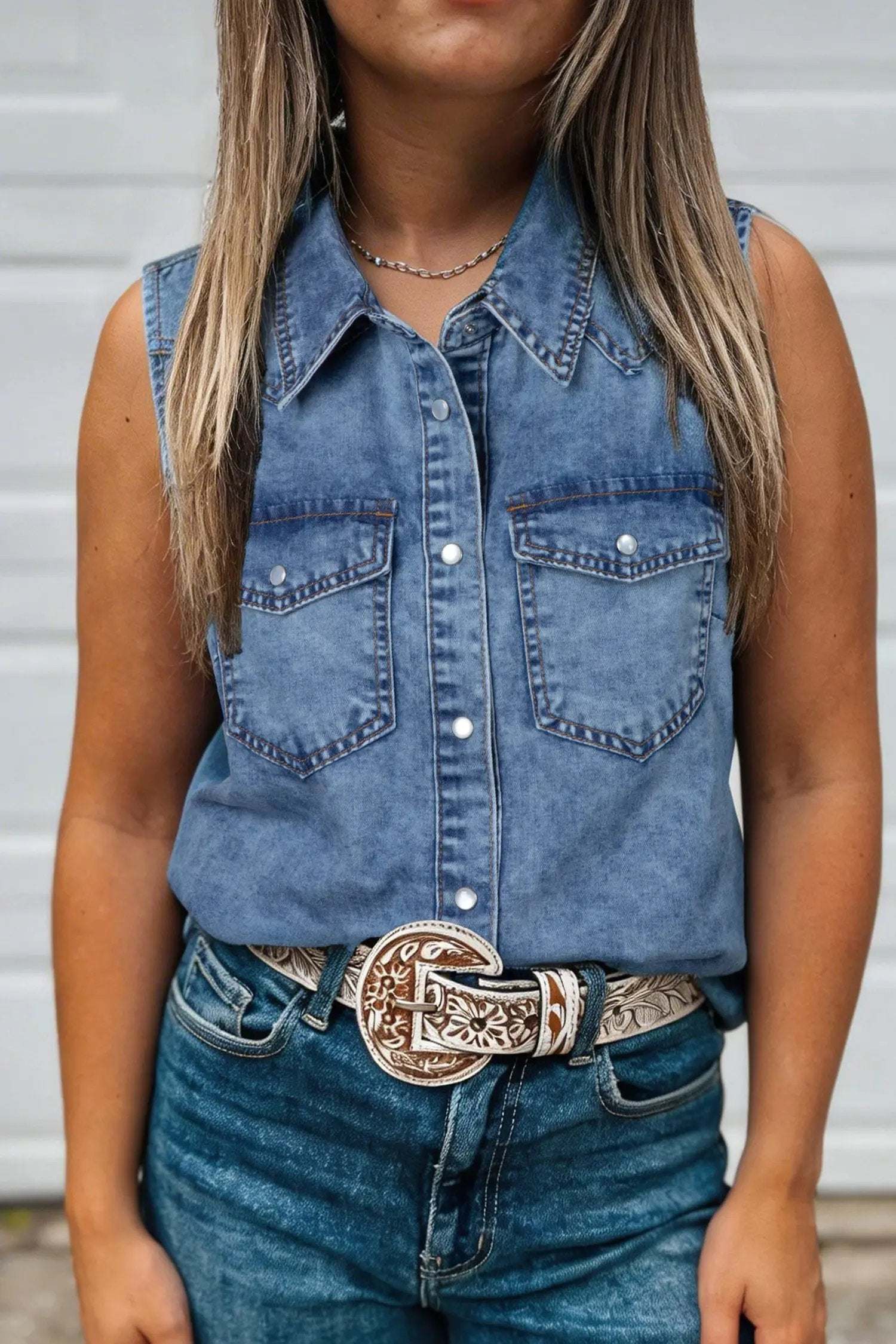 Sleeveless buttoned front denim top with collar and Western Chic style