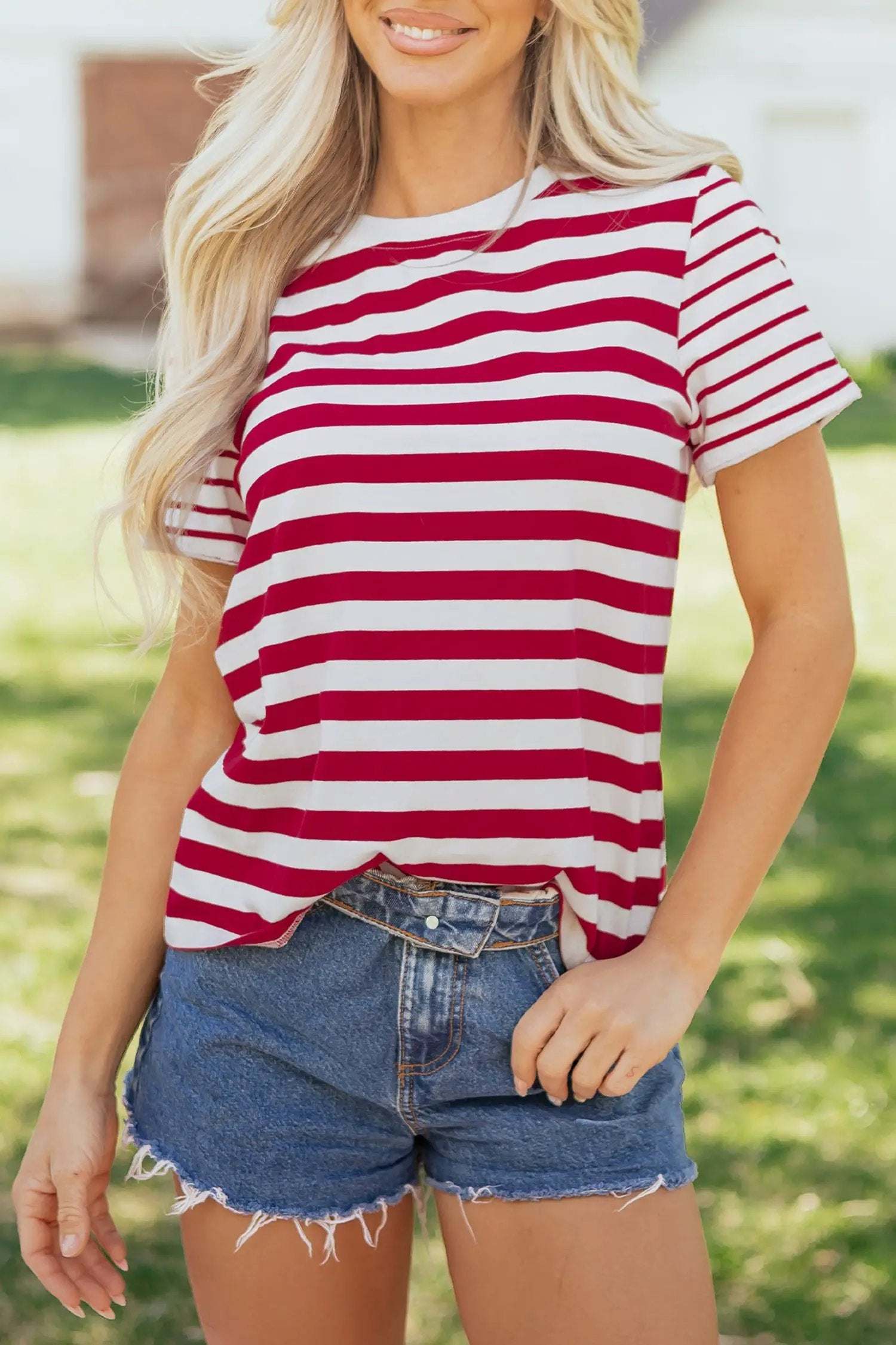 Woman wearing colorblock stripe tee with round neck and short sleeves