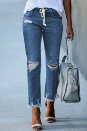 Dark blue elastic waist straight leg destroyed raw hem jeans with drawstring