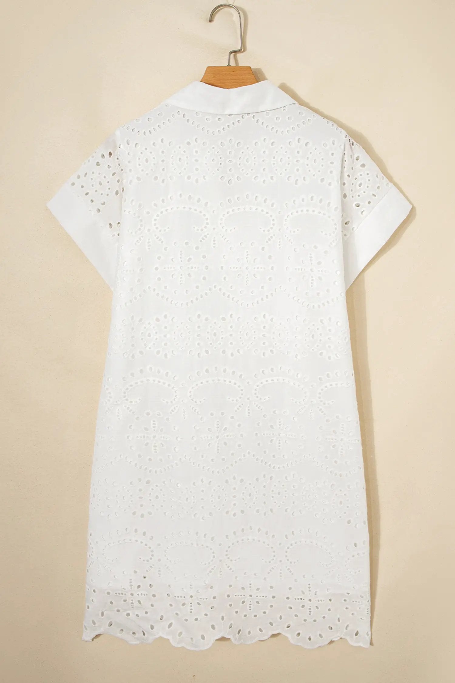 White solid color eyelet embroidered T shirt mini dress with airy texture and relaxed A-line silhouette