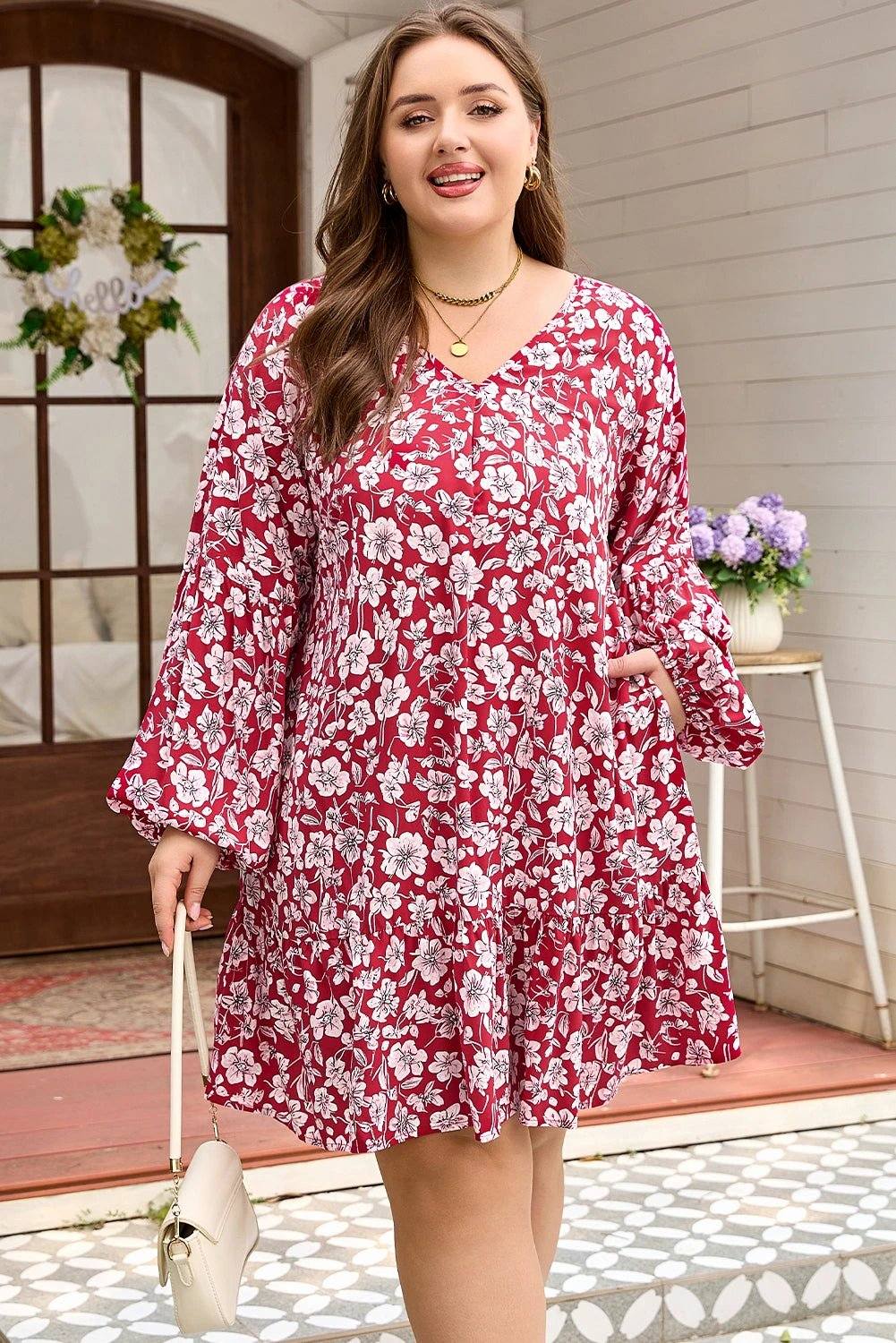 Plus size purple floral midi dress with V-neck and balloon sleeves