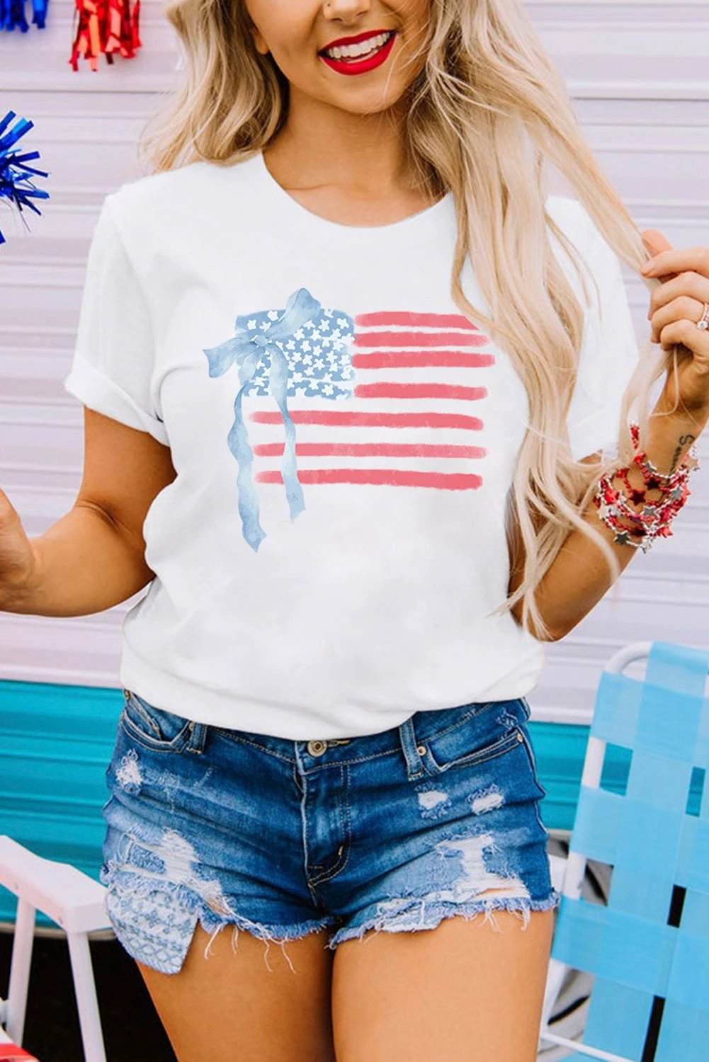 White crew neck t-shirt with American flag bow knot print graphic on chest